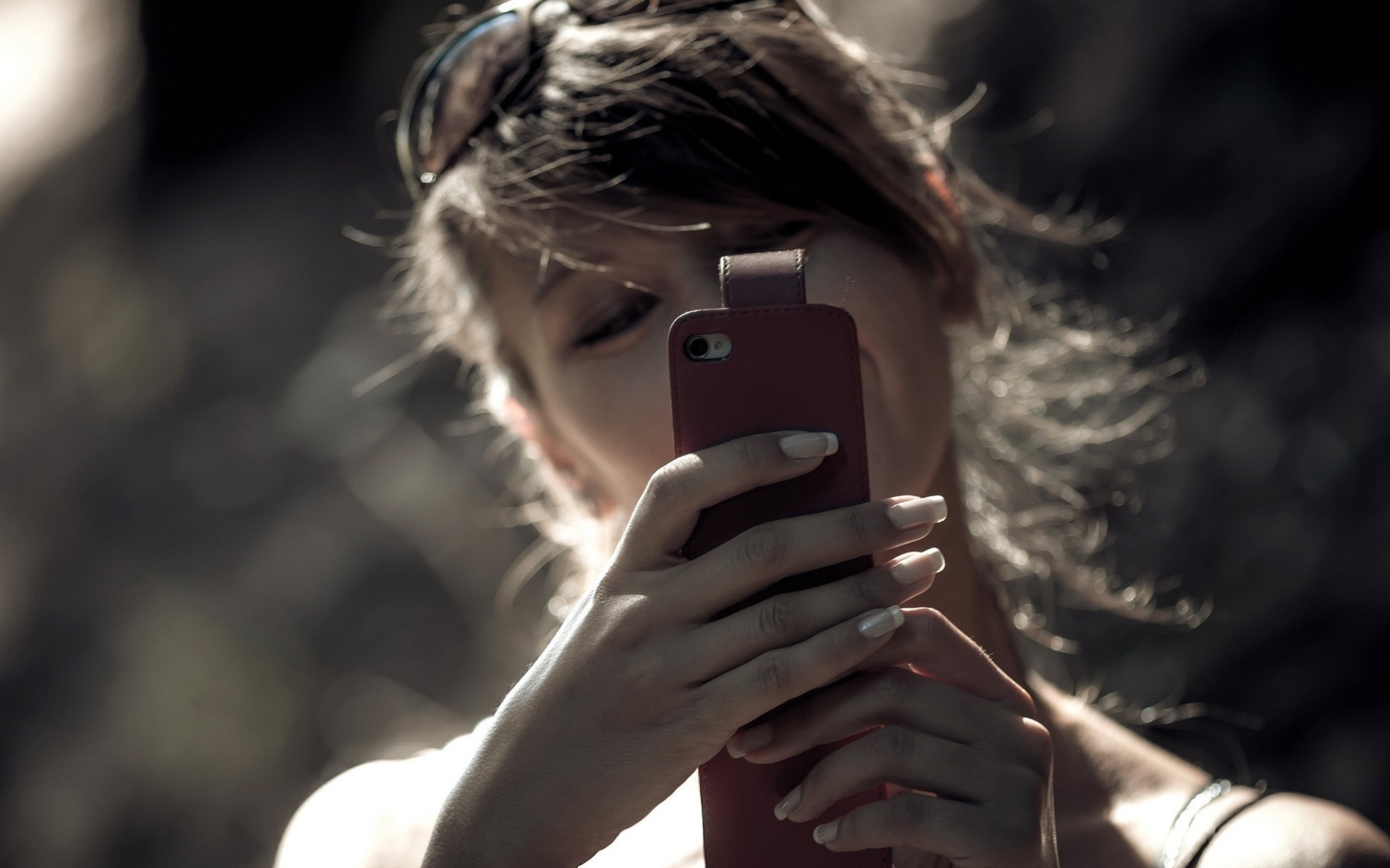 Woman taking a selfie with a red phone HD Wallpaper