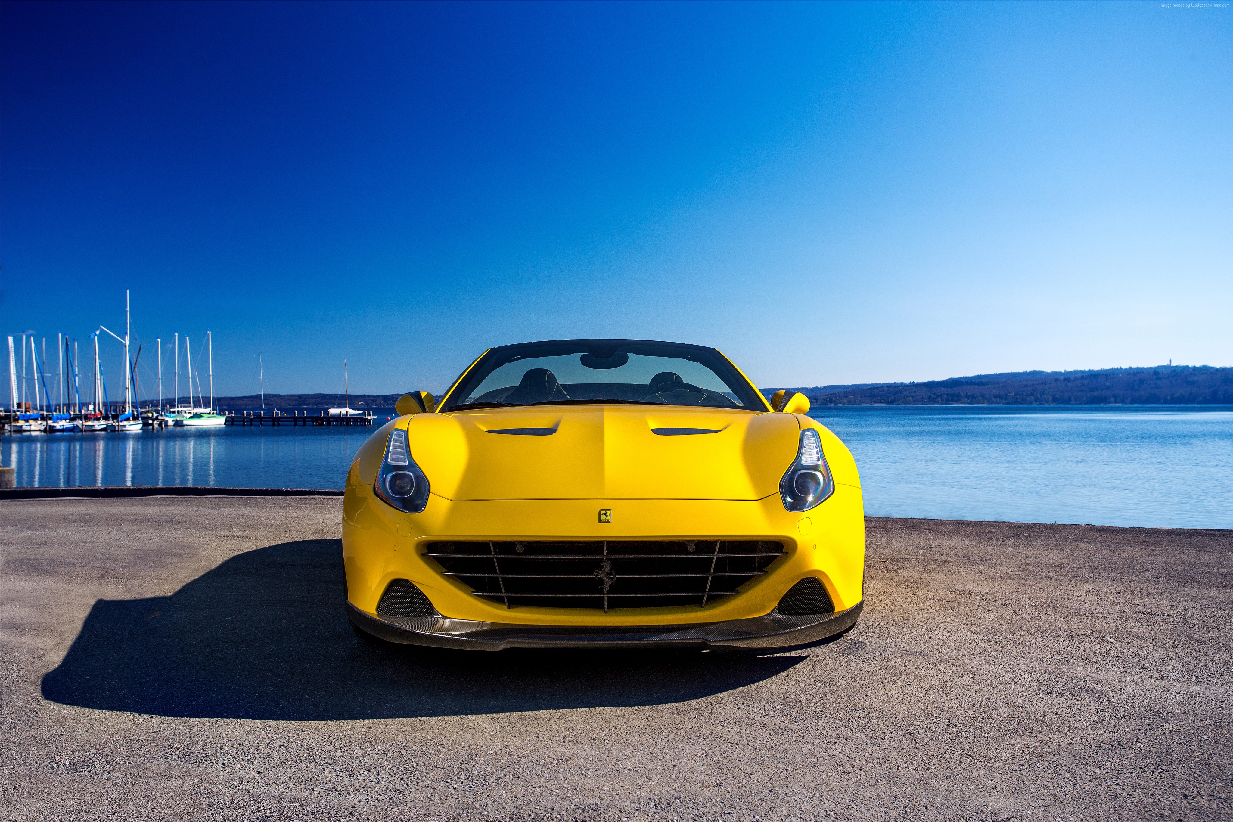 Yellow Ferrari California T convertible by a lake HD Wallpaper