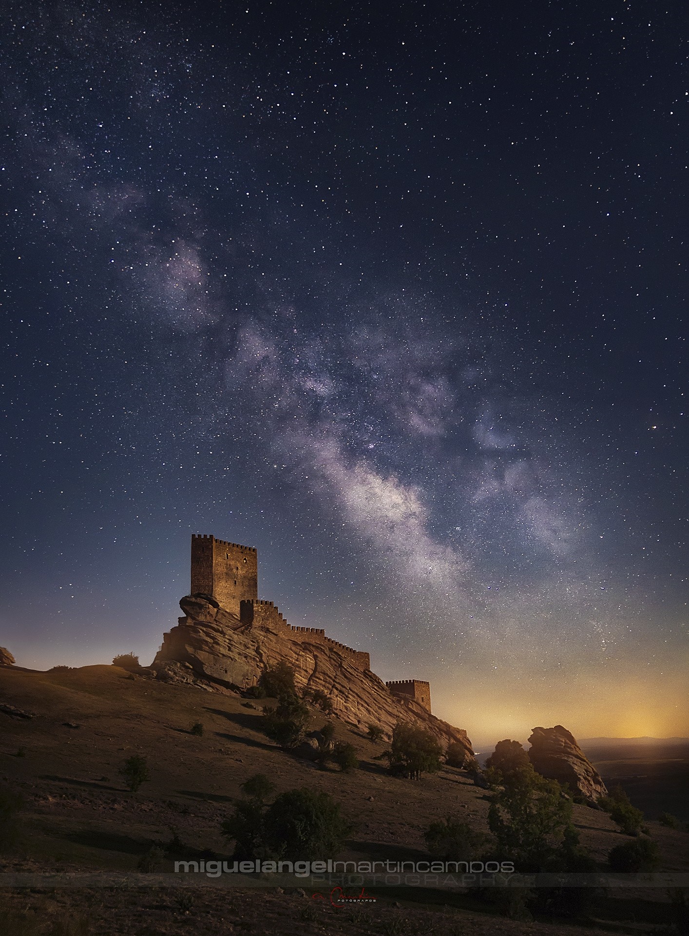 Castle on a rocky hill under the Milky Way HD Wallpaper