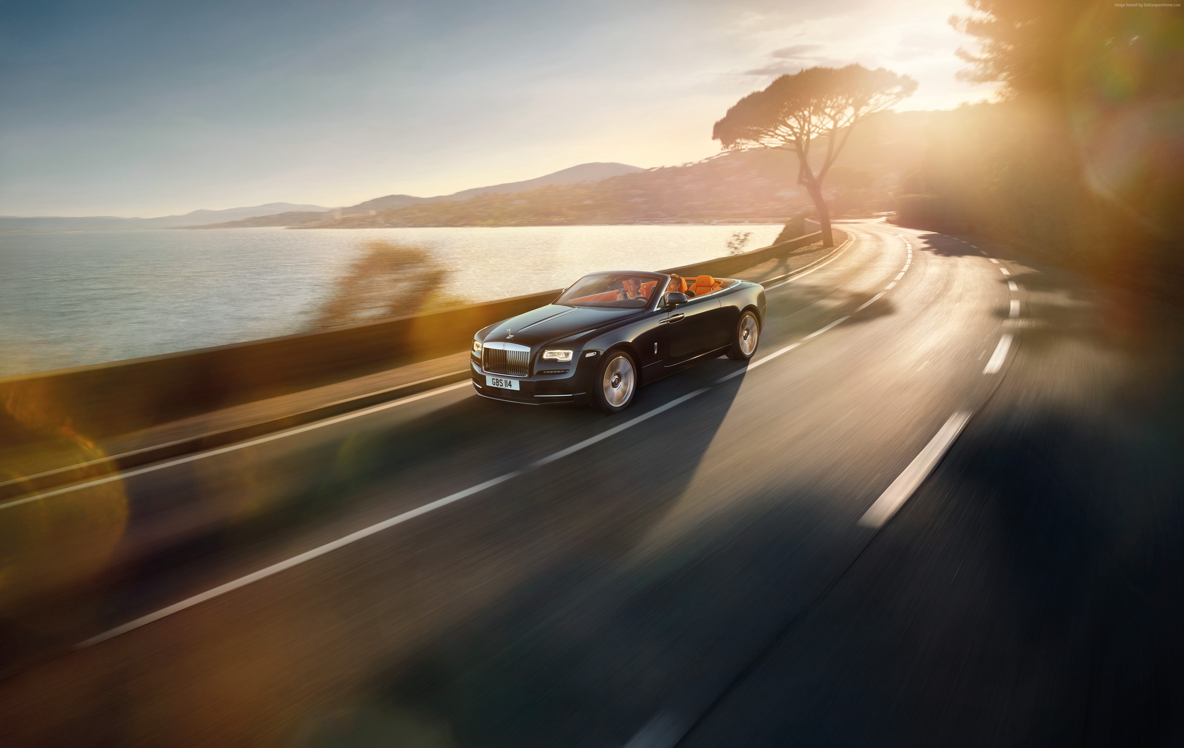 Rolls-Royce Dawn convertible driving on coastal road HD Wallpaper
