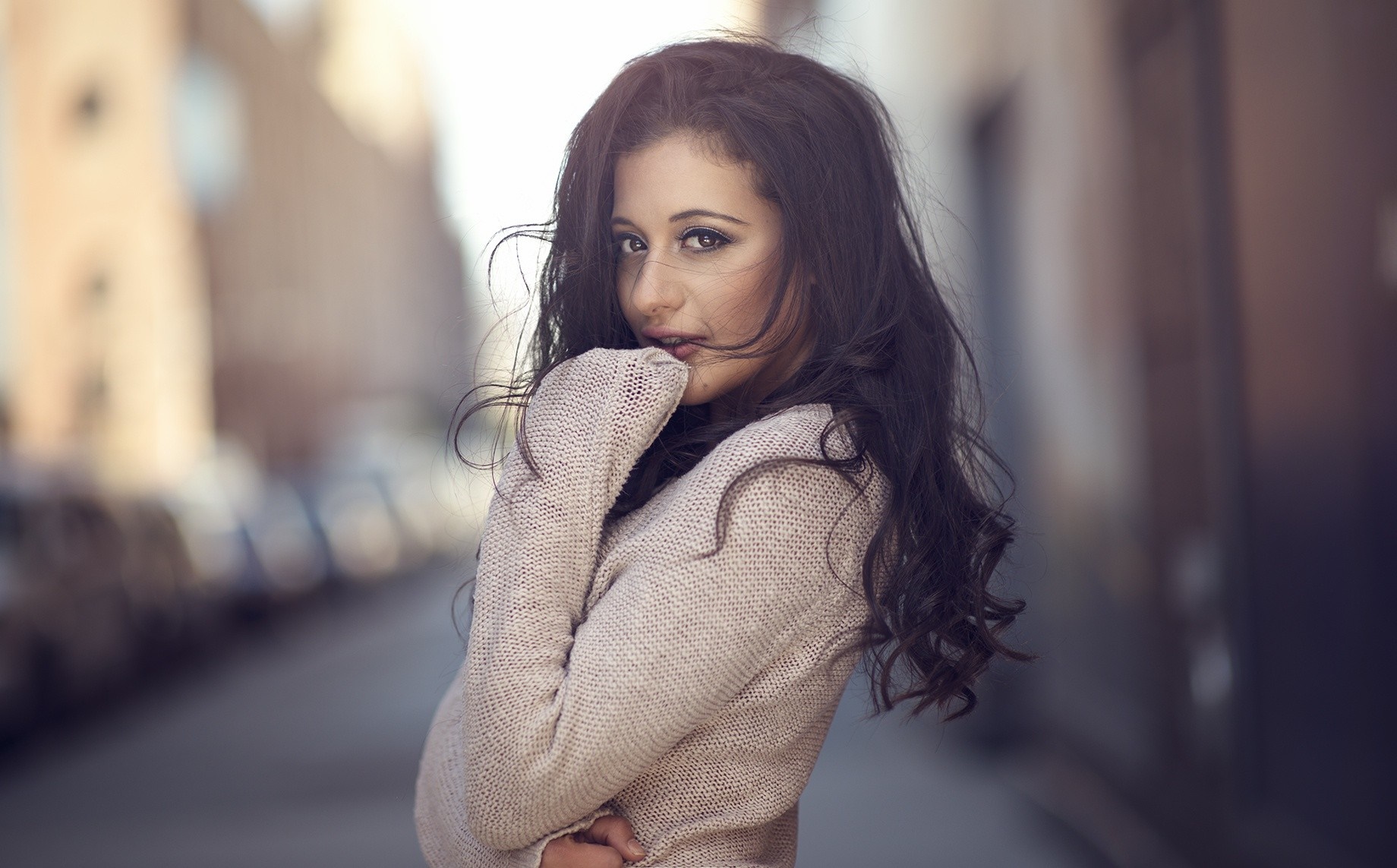 Woman in a sweater posing outdoors HD Wallpaper