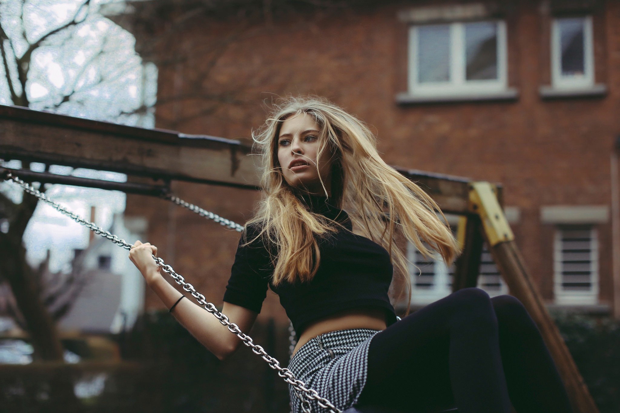 Woman on a swing set HD Wallpaper