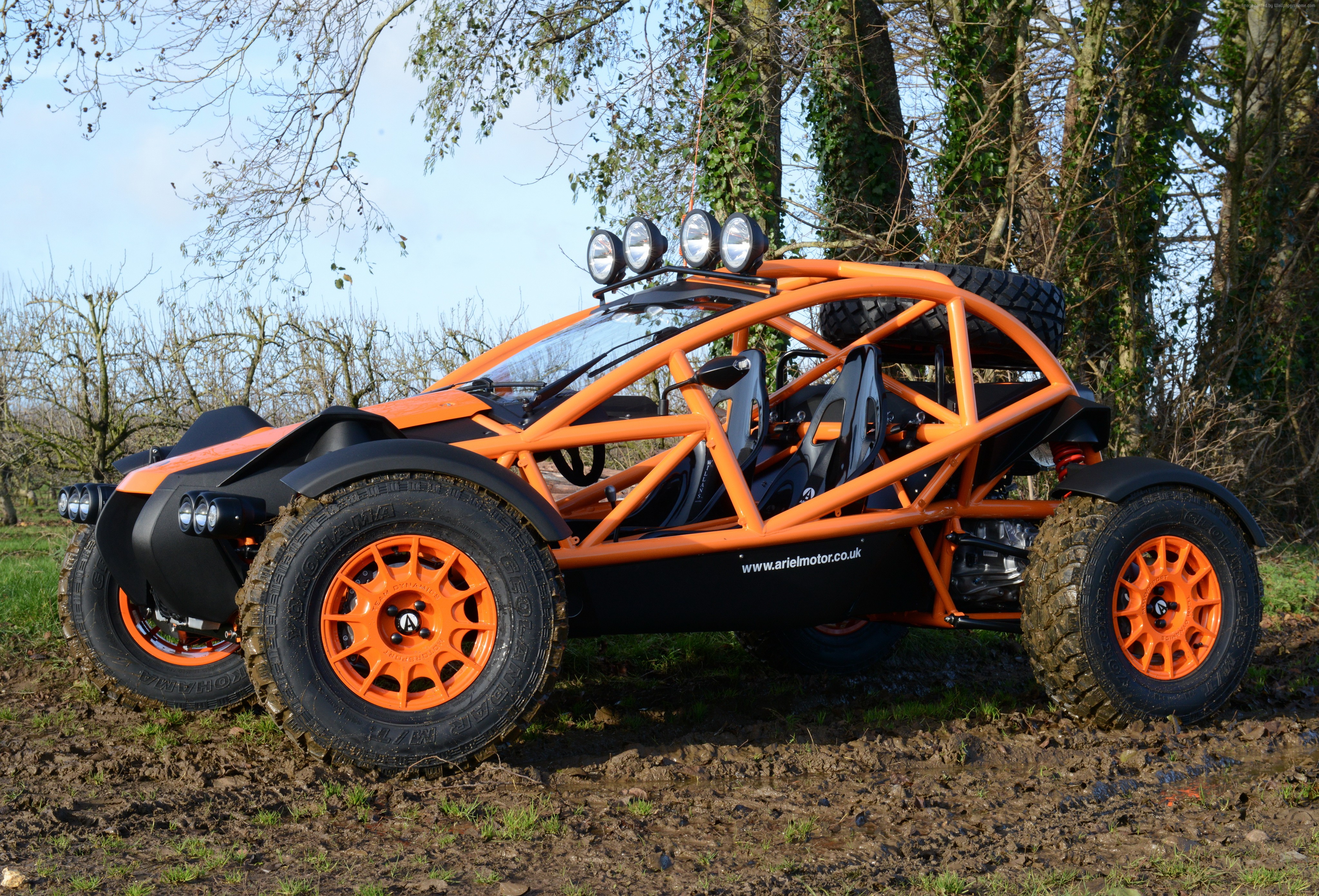 Orange Ariel Nomad off-road vehicle on muddy ground HD Wallpaper