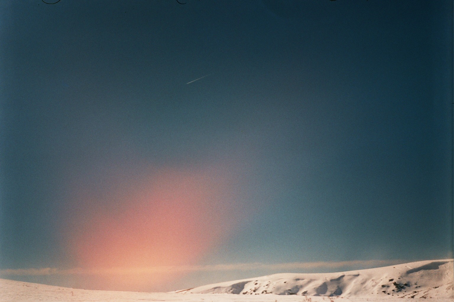 Snowy landscape with shooting star in the sky HD Wallpaper