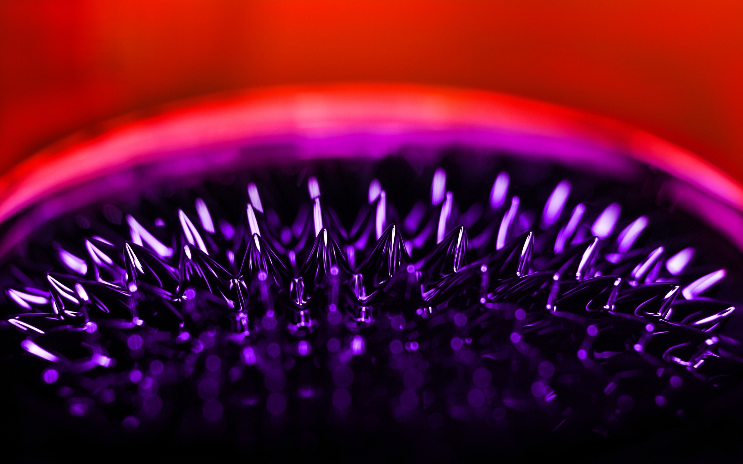 Ferrofluid spikes in purple and red light HD Wallpaper