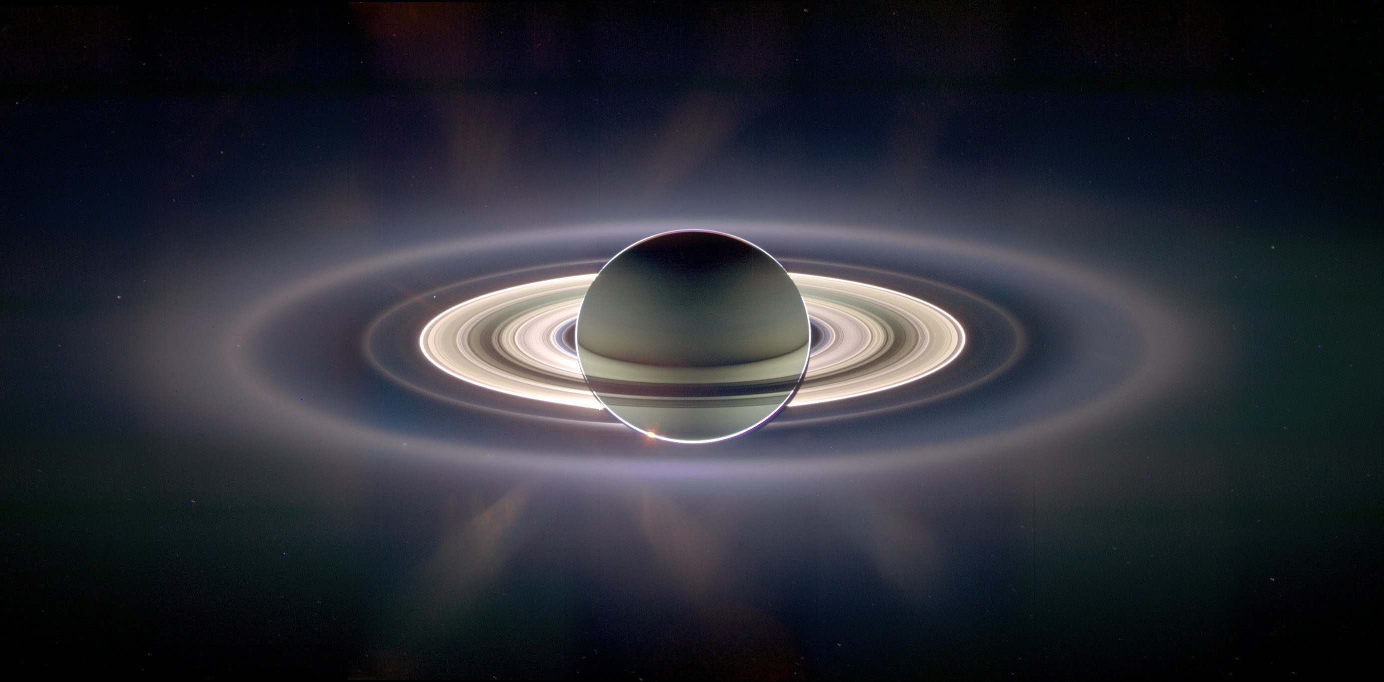 Saturn and its rings in space HD Wallpaper