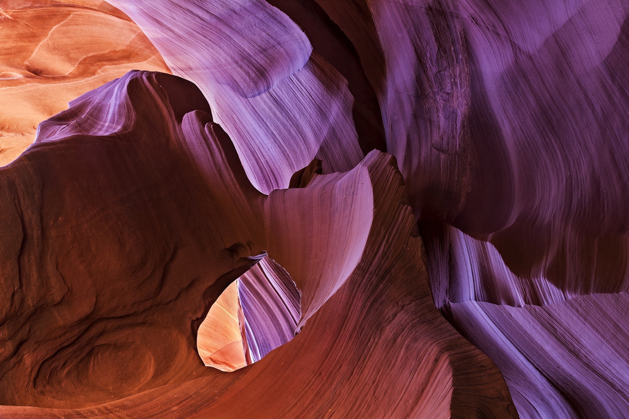 Antelope Canyon rock formations with purple and orange light HD Wallpaper