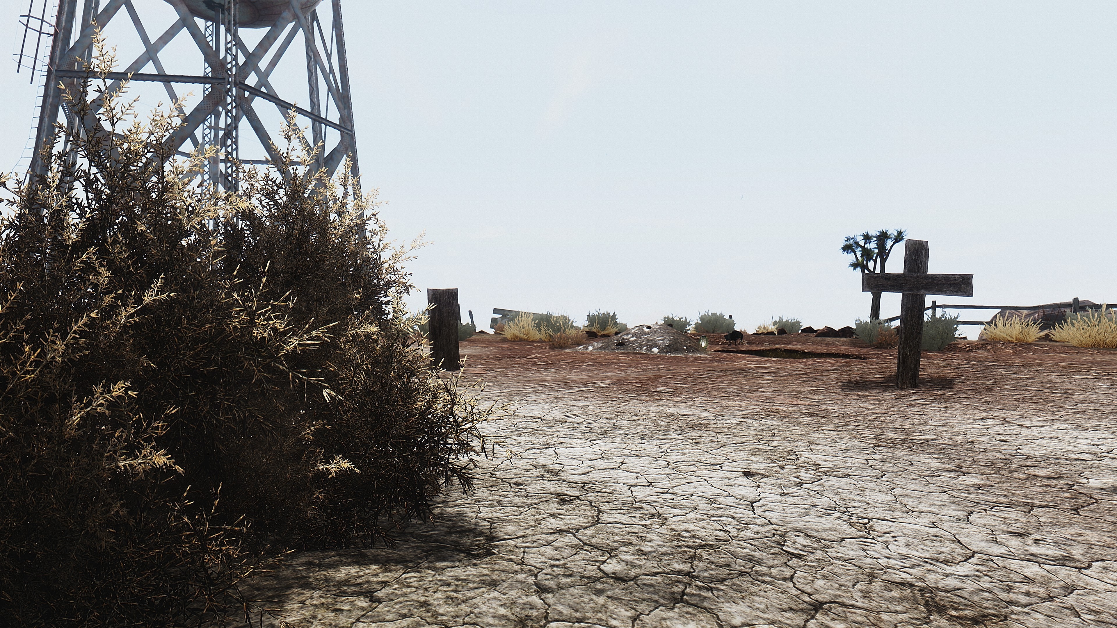 Fallout New Vegas desert landscape with water tower and graves HD Wallpaper