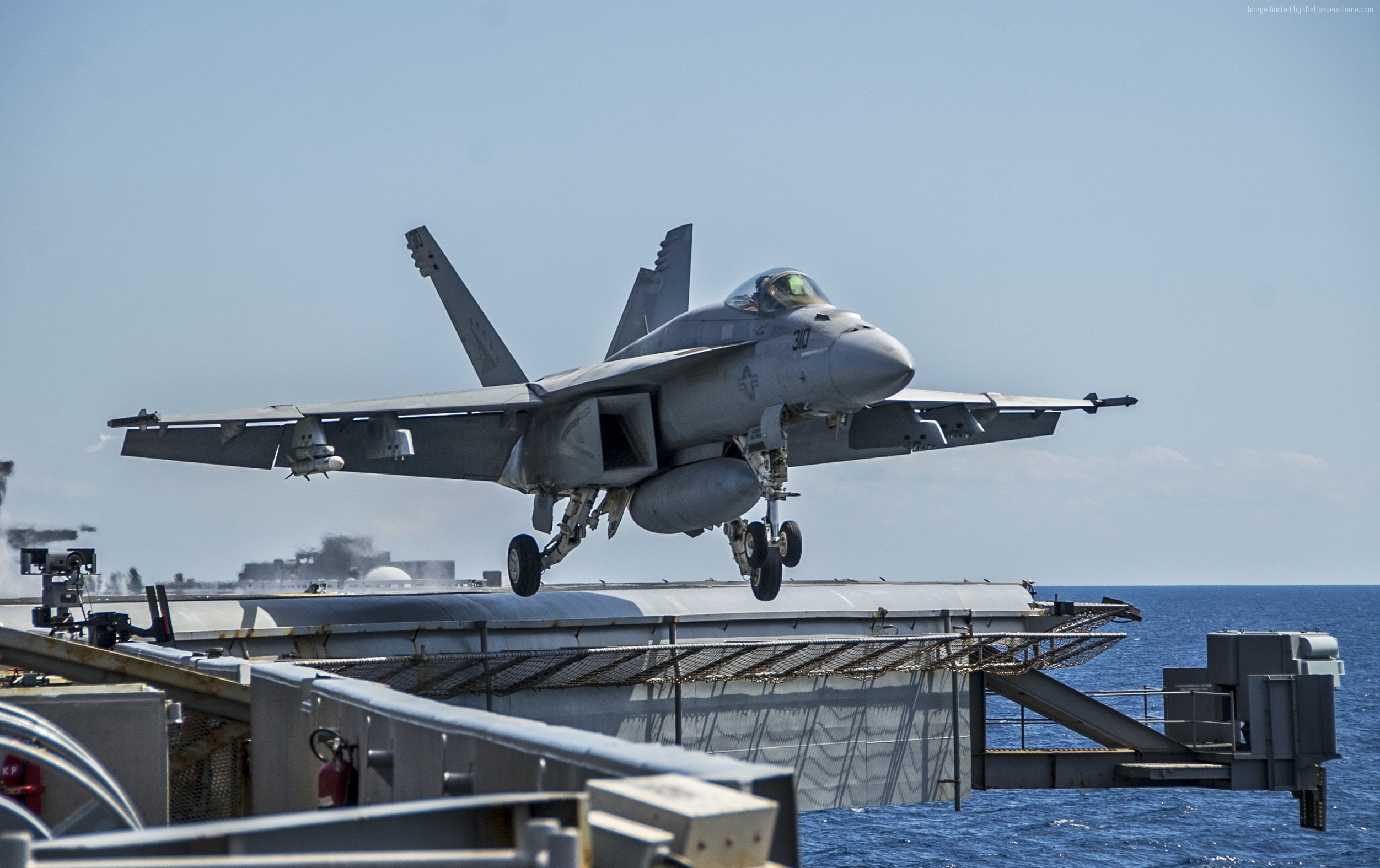 F/A-18E Super Hornet landing on aircraft carrier HD Wallpaper