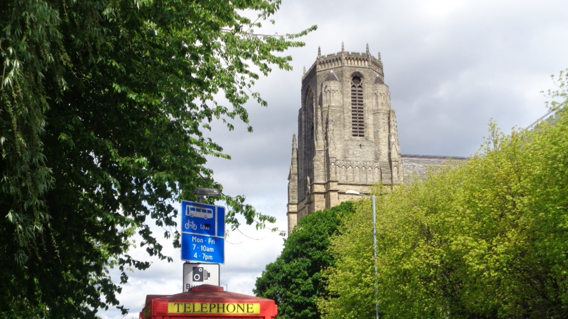 Building tower with trees and telephone box HD Wallpaper