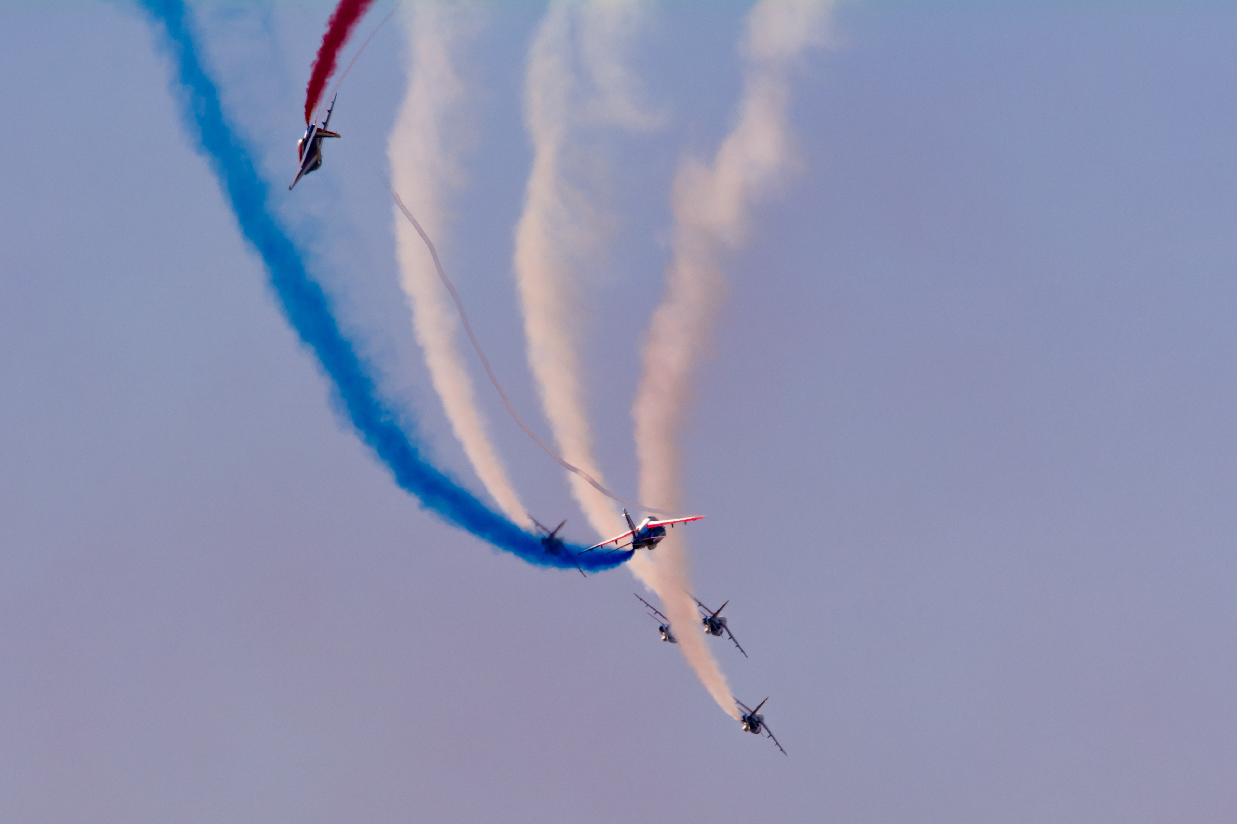 Patrouille de France jets performing aerobatics with colored smoke HD Wallpaper