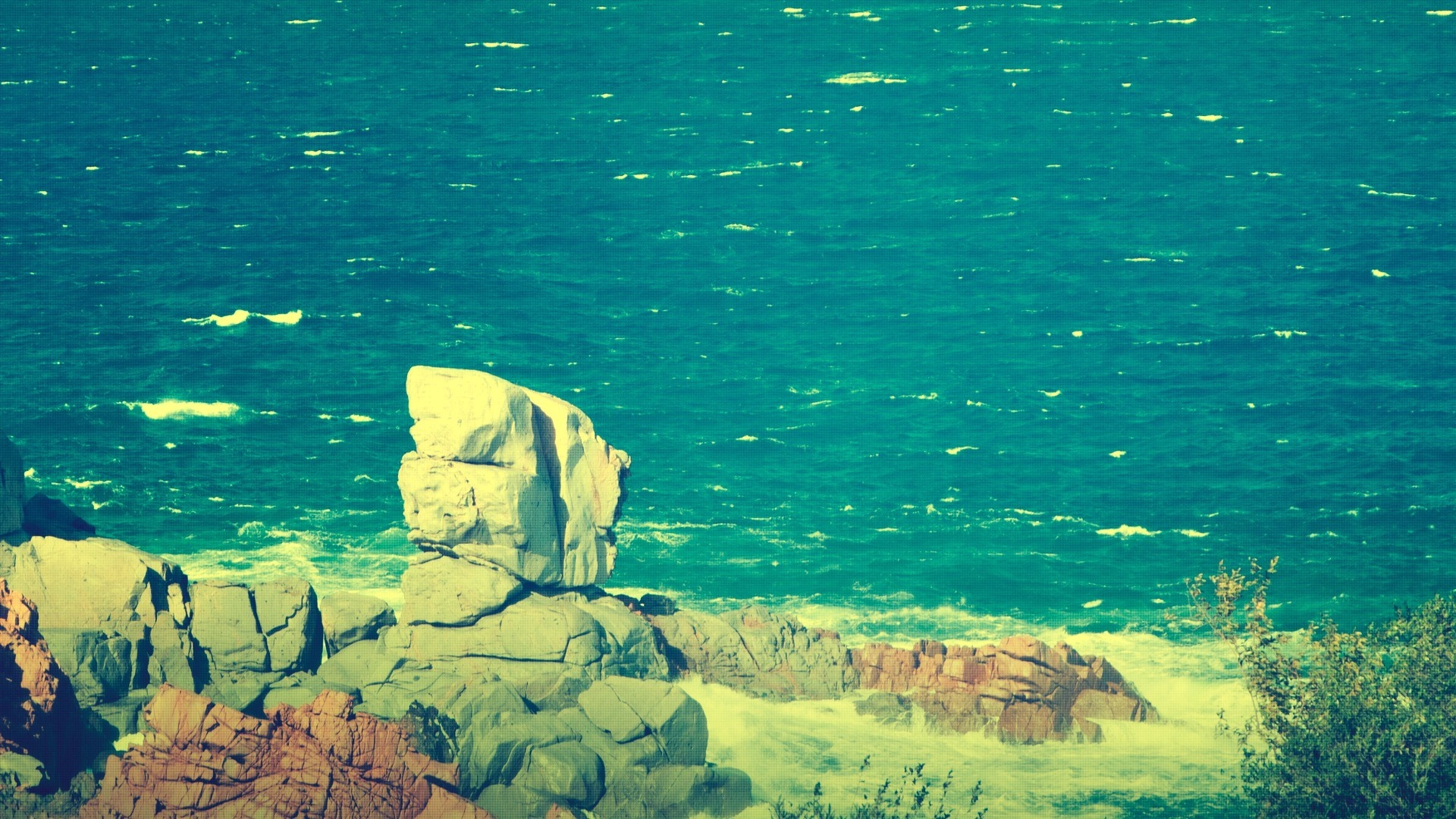 Rocky coast with turquoise sea and waves HD Wallpaper