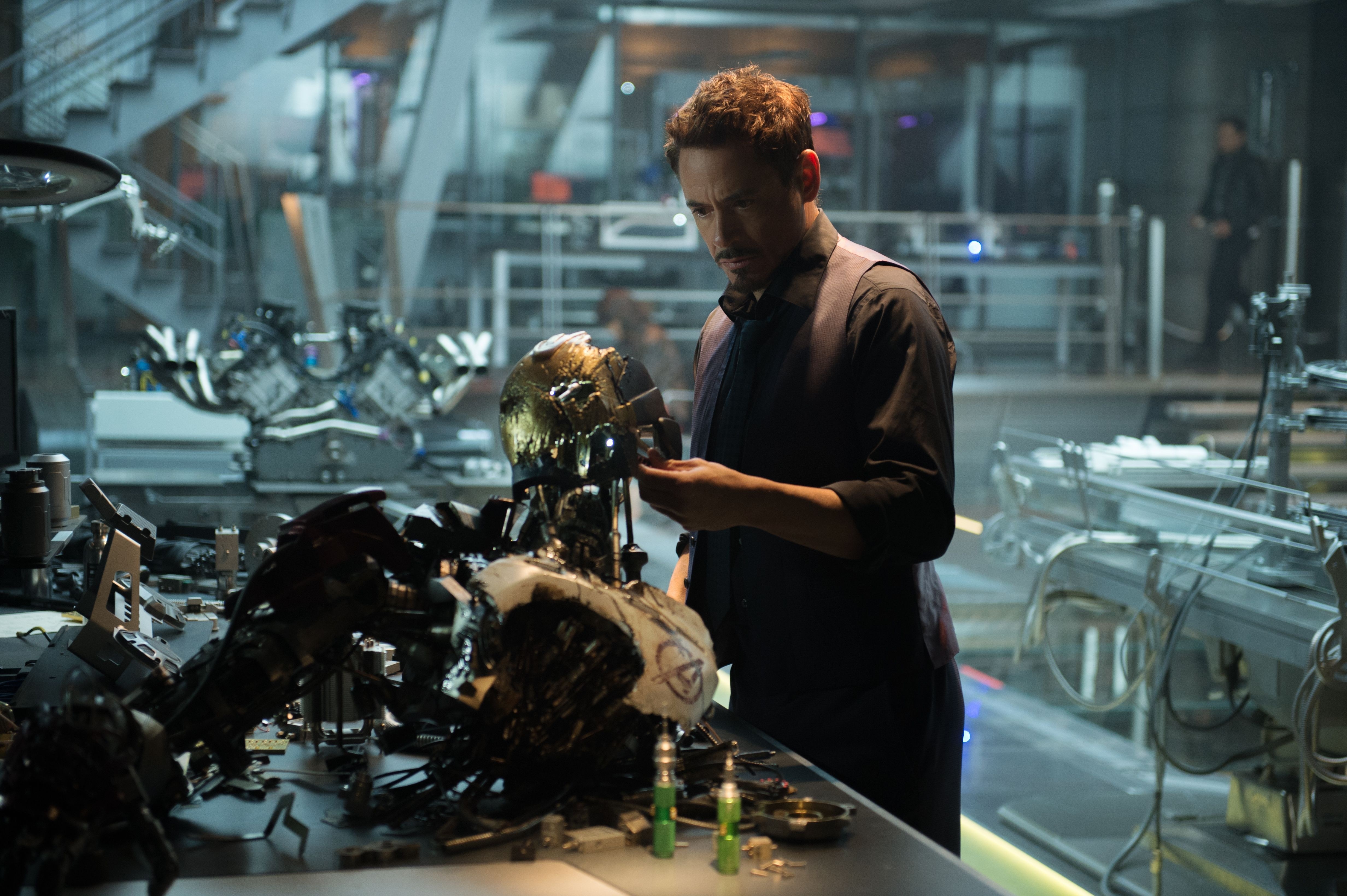 Tony Stark from Avengers Age of Ultron in a workshop HD Wallpaper