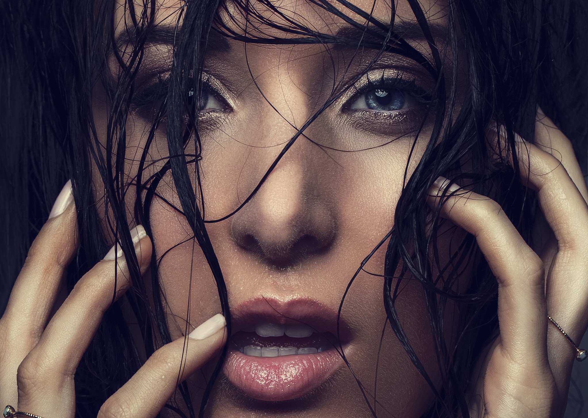 Close up portrait of a woman with wet hair and blue eyes HD Wallpaper