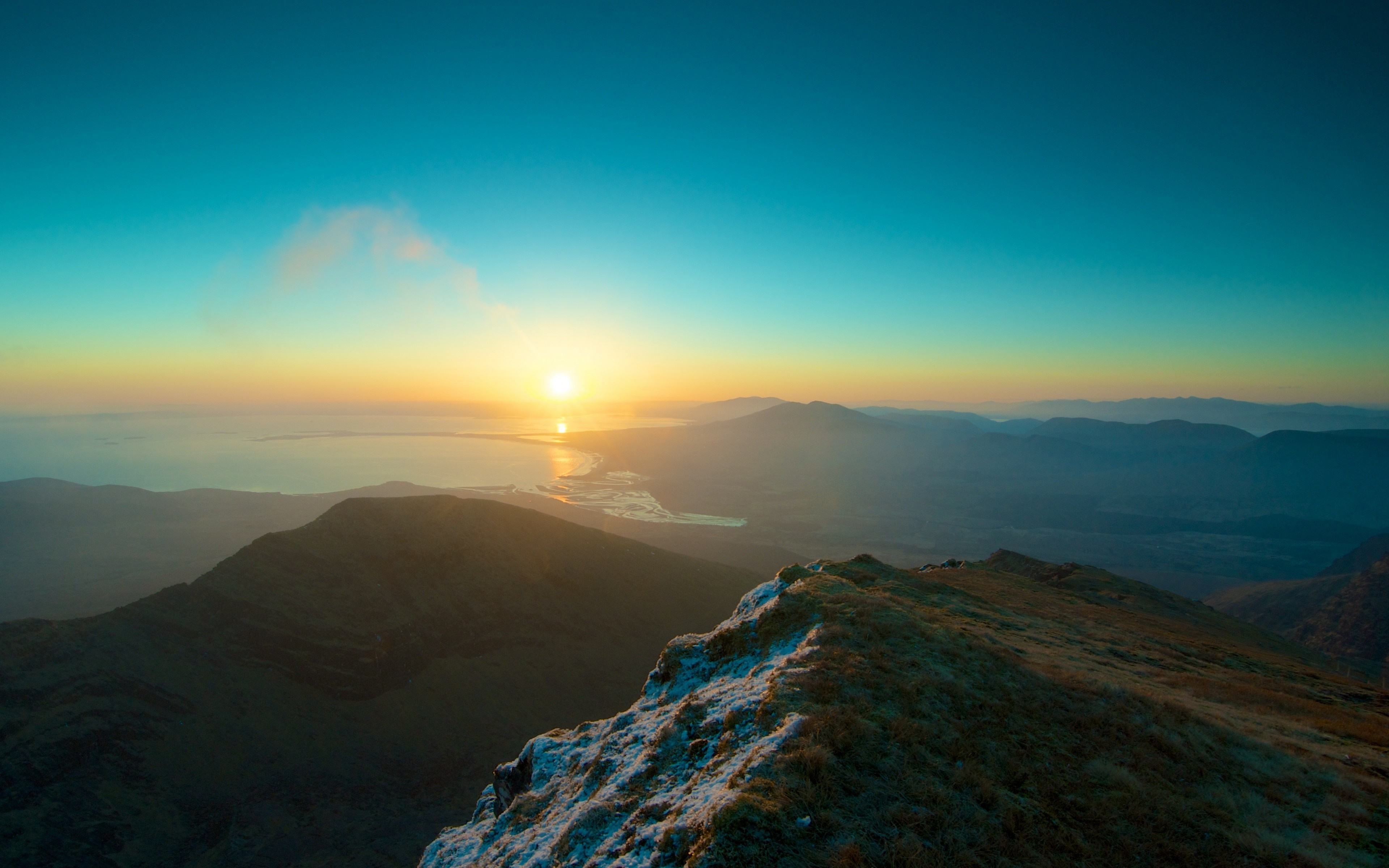 Sunrise over mountains and a lake HD Wallpaper