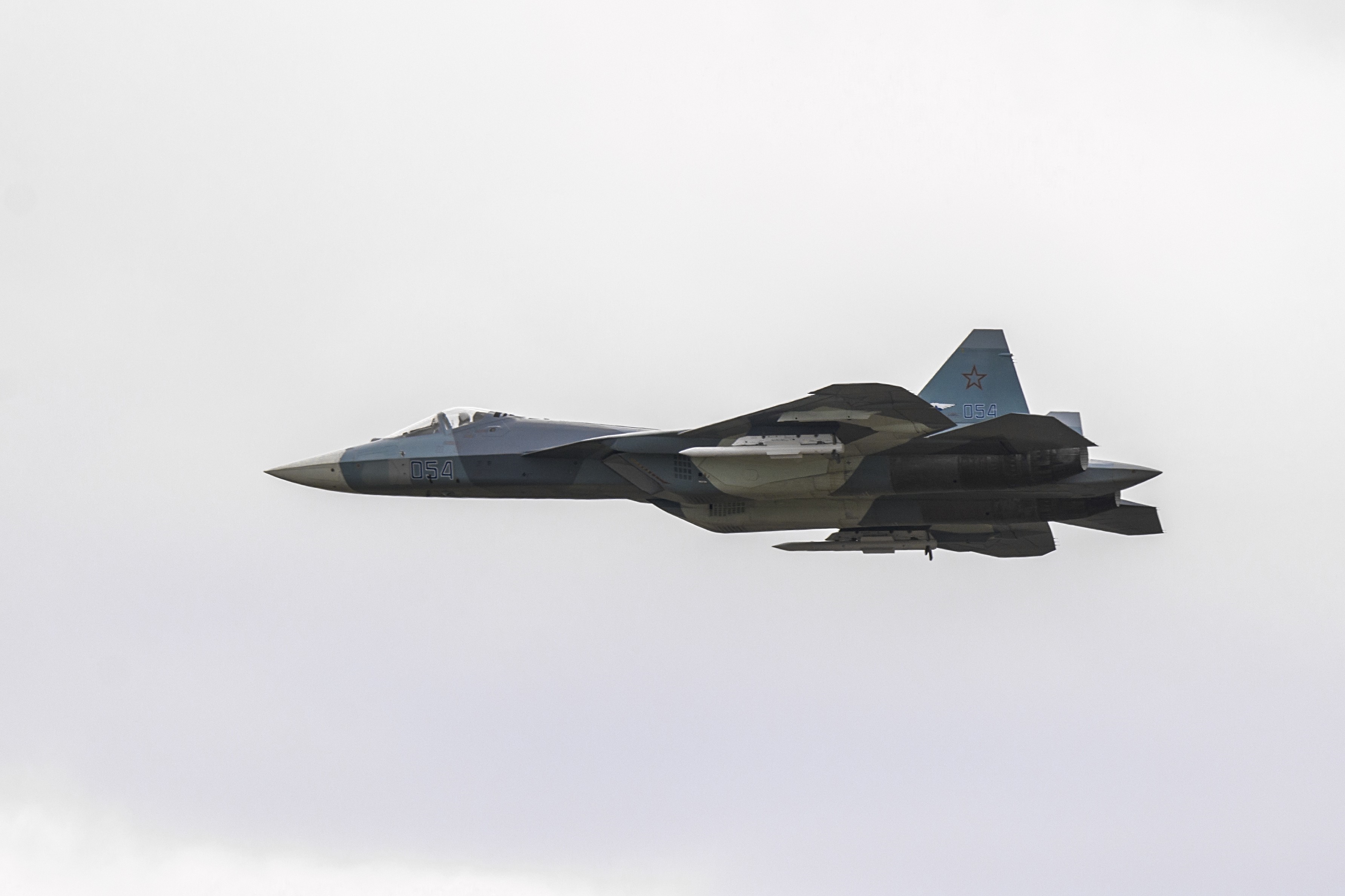 Sukhoi Su-57 fighter jet in flight HD Wallpaper