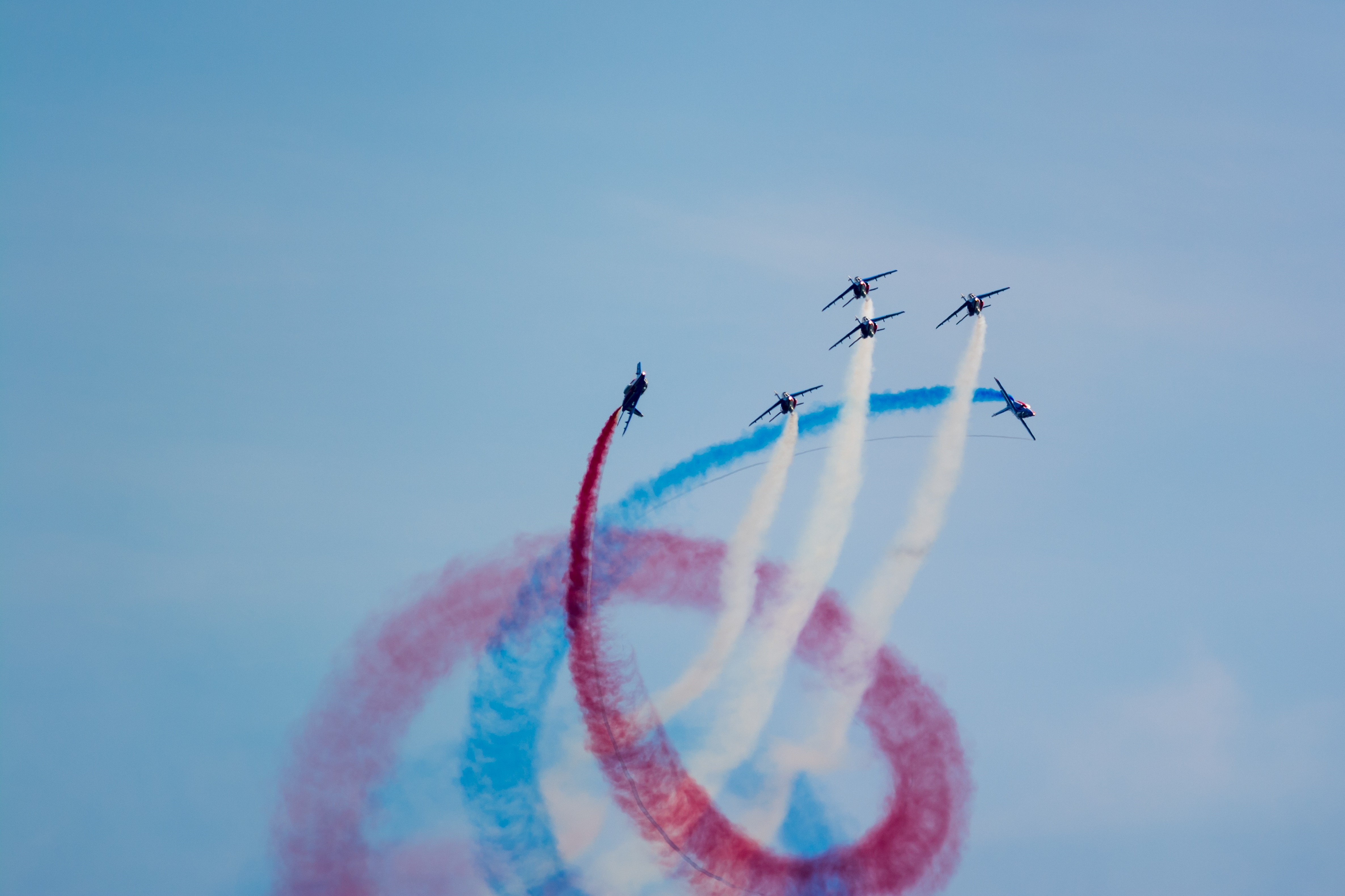Patrouille de France Alpha Jets performing aerobatics with smoke trails HD Wallpaper
