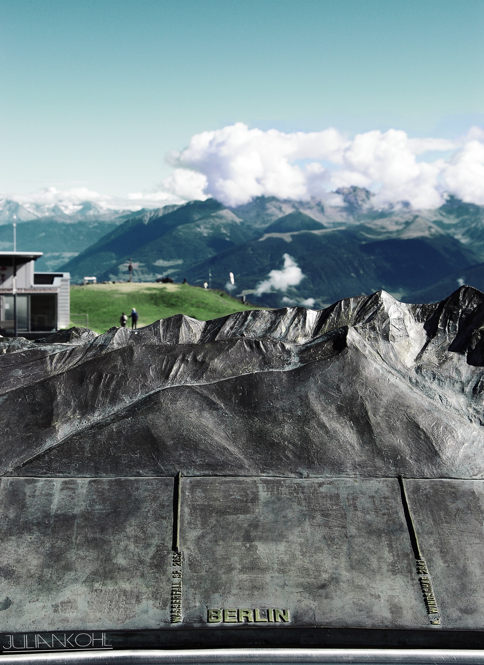 Metal relief map of mountains with Berlin label HD Wallpaper