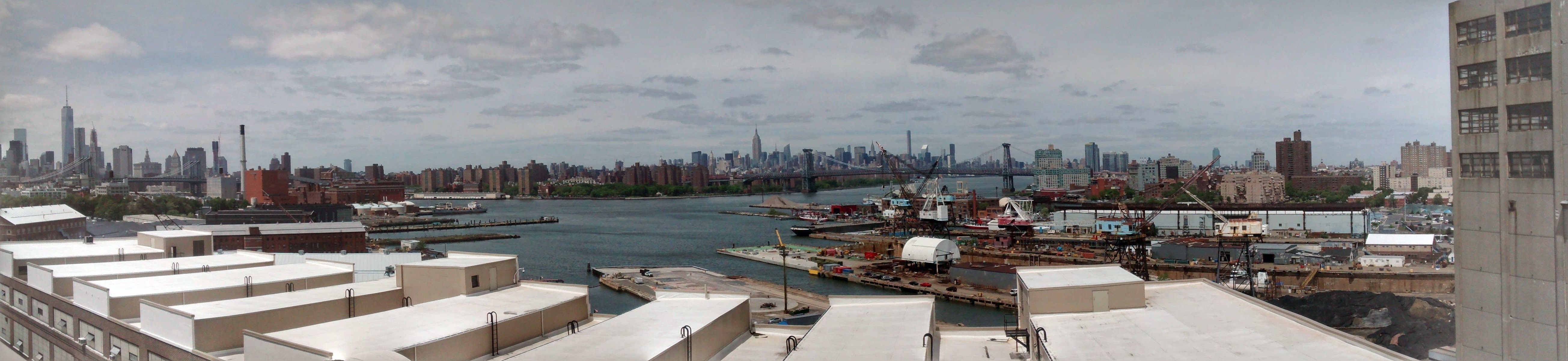 Panorama of New York City skyline and industrial waterfront HD Wallpaper