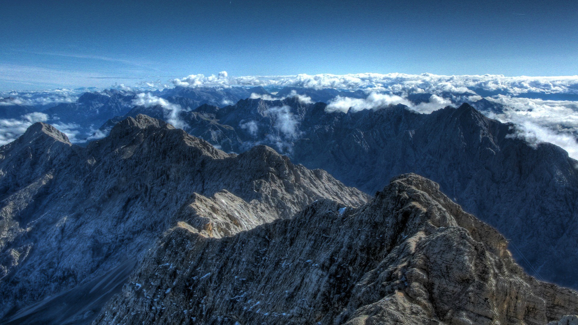 Mountain range with clouds and blue sky HD Wallpaper