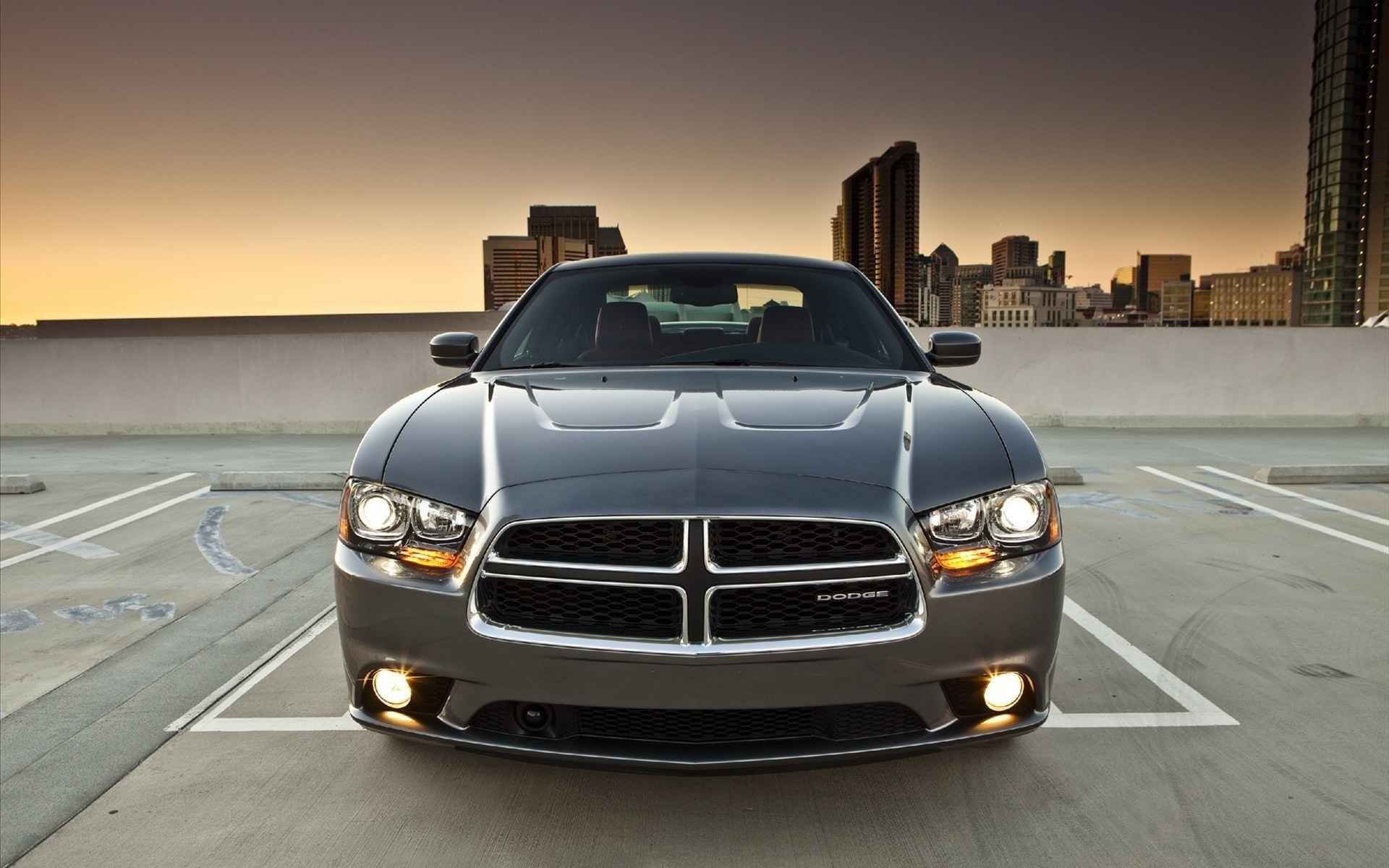 Gray Dodge Charger R/T parked in a city parking lot HD Wallpaper
