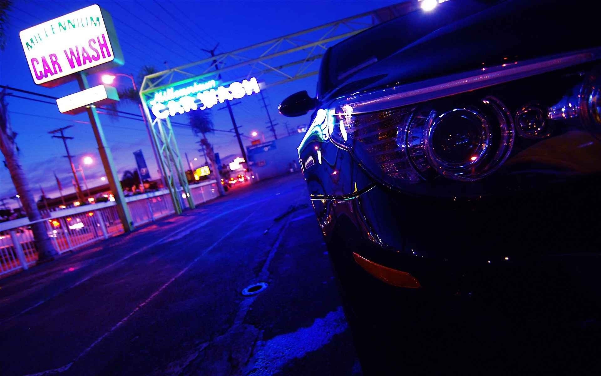 Millennium Car Wash at Night with Car HD Wallpaper