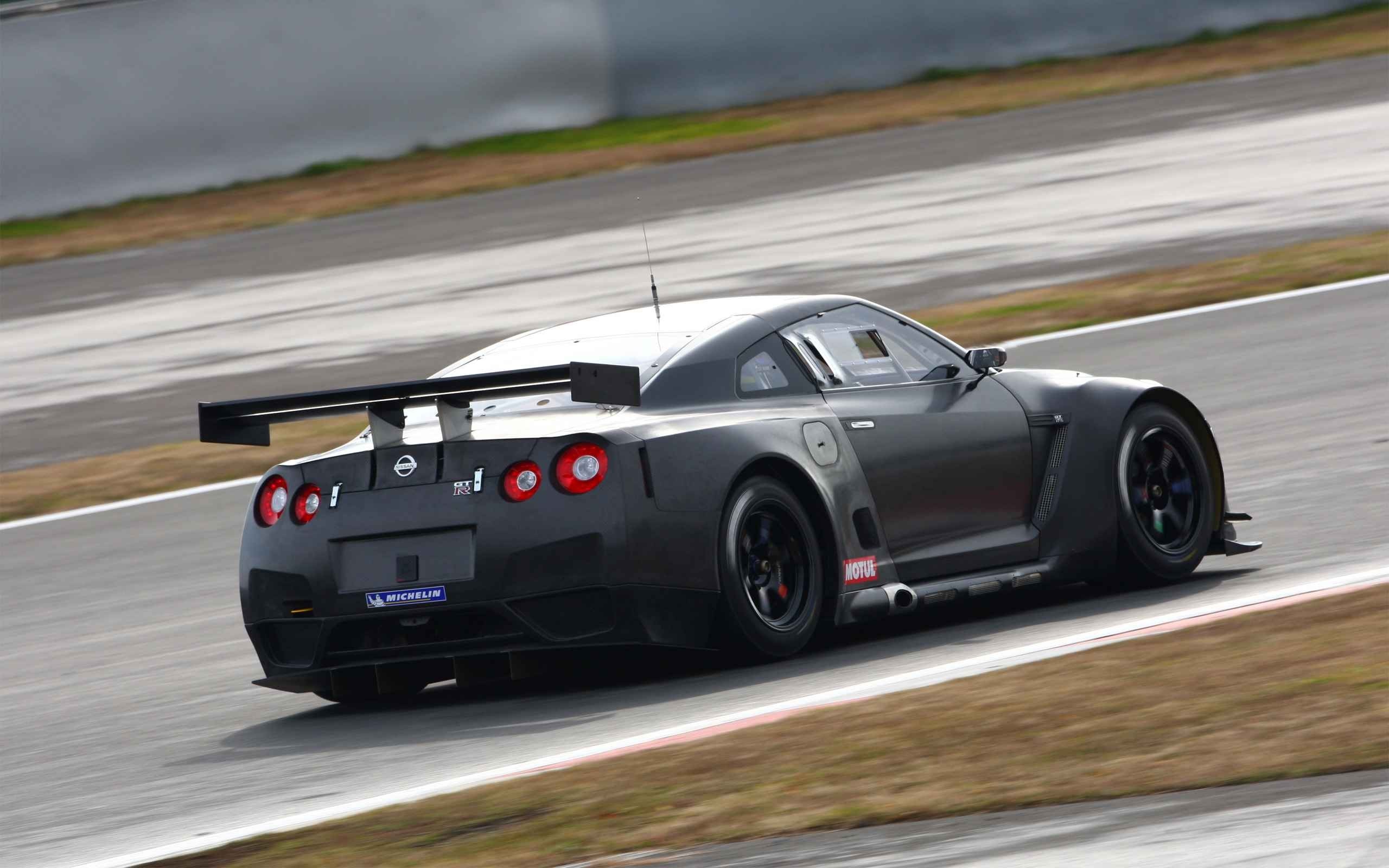 Nissan GT-R race car on track HD Wallpaper