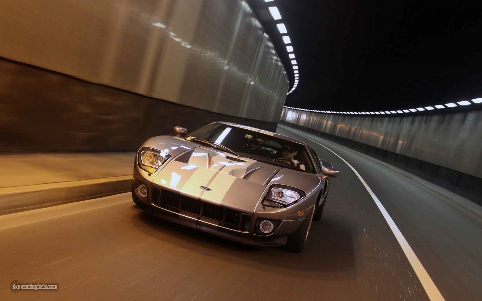 Silver Ford GT driving through a tunnel HD Wallpaper