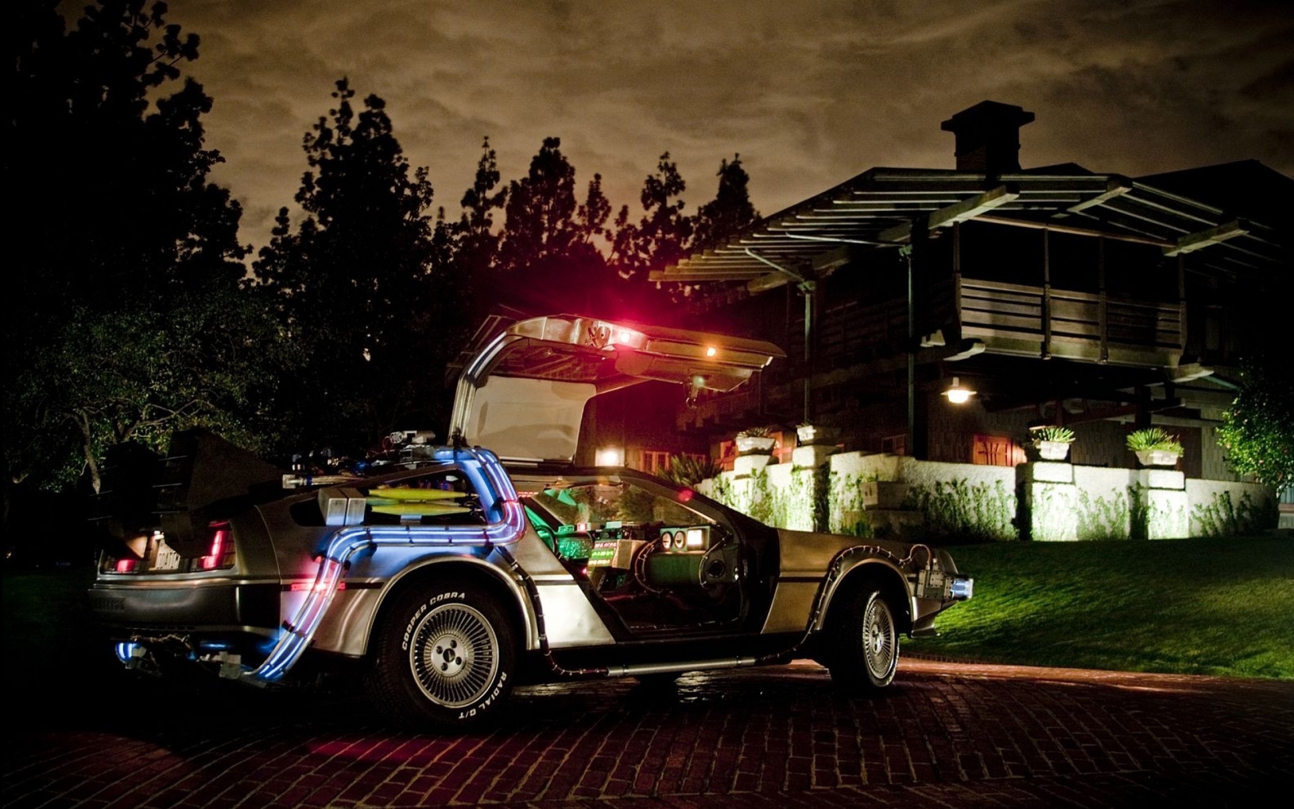 DeLorean time machine from Back to the Future at night HD Wallpaper