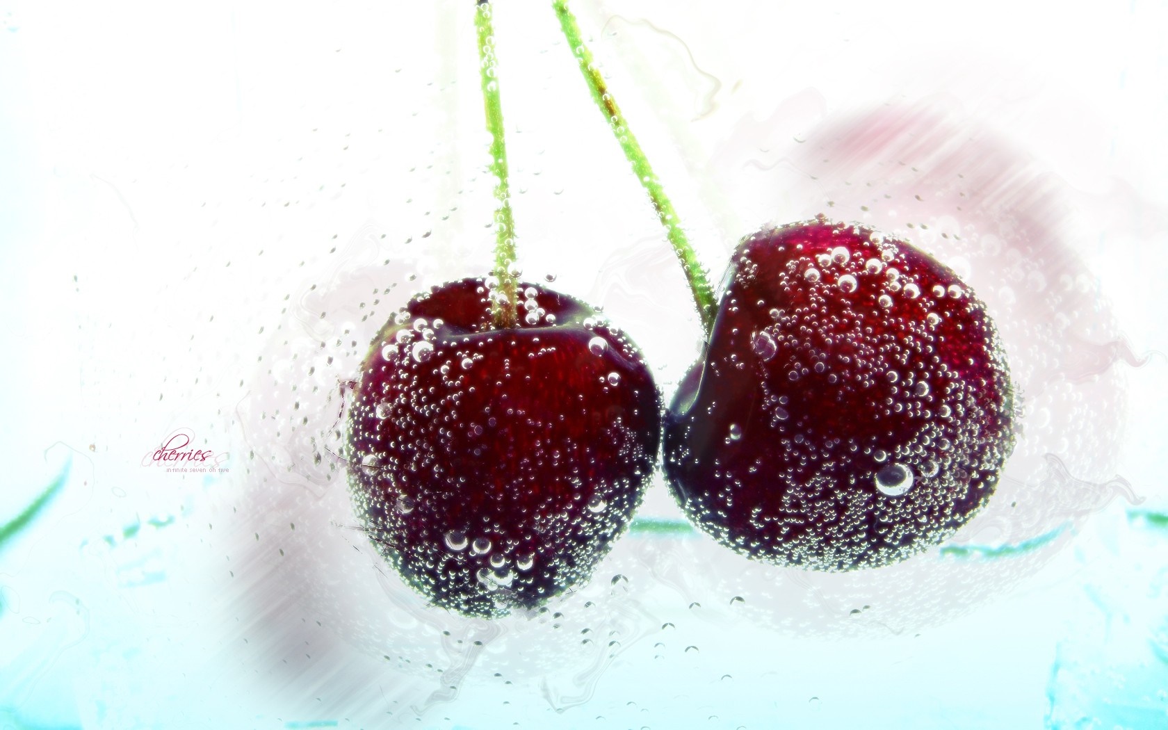 Two cherries submerged in water with bubbles HD Wallpaper