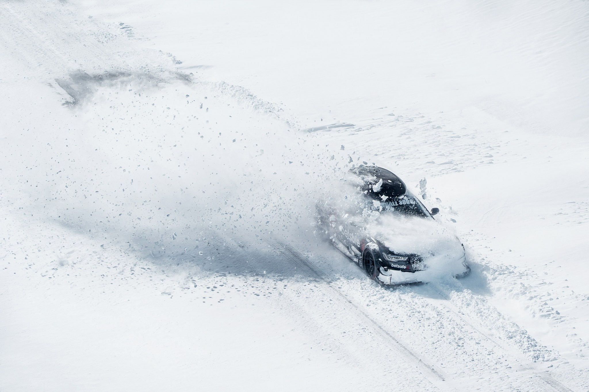 Audi RS6 Avant drifting in snow during Gumball 3000 HD Wallpaper