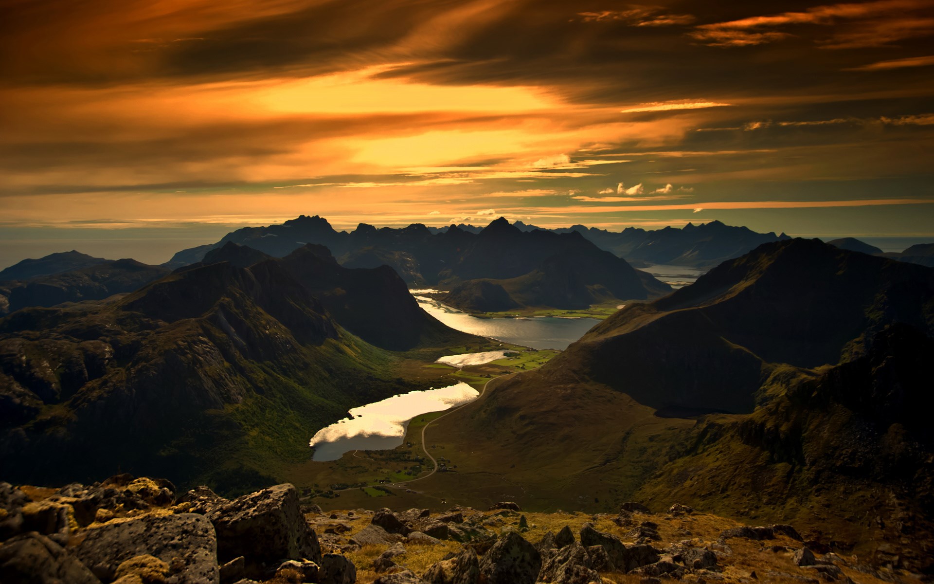 Mountain landscape with lakes and dramatic sunset sky HD Wallpaper