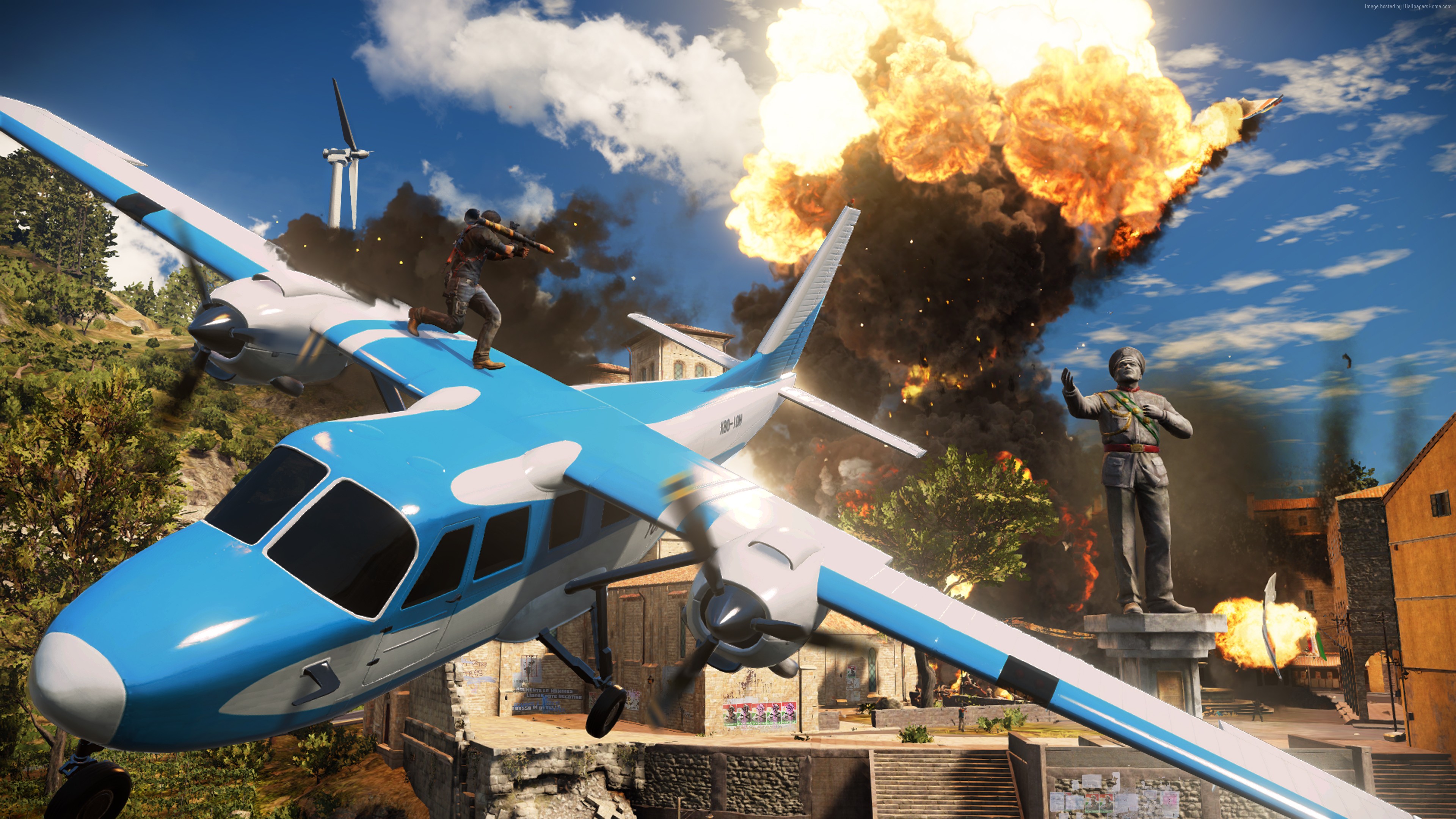Man on airplane during explosion in Just Cause 3 HD Wallpaper