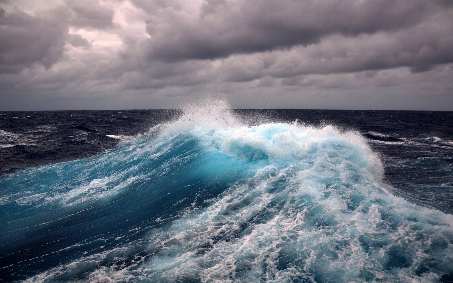 Stormy ocean with a large crashing wave HD Wallpaper