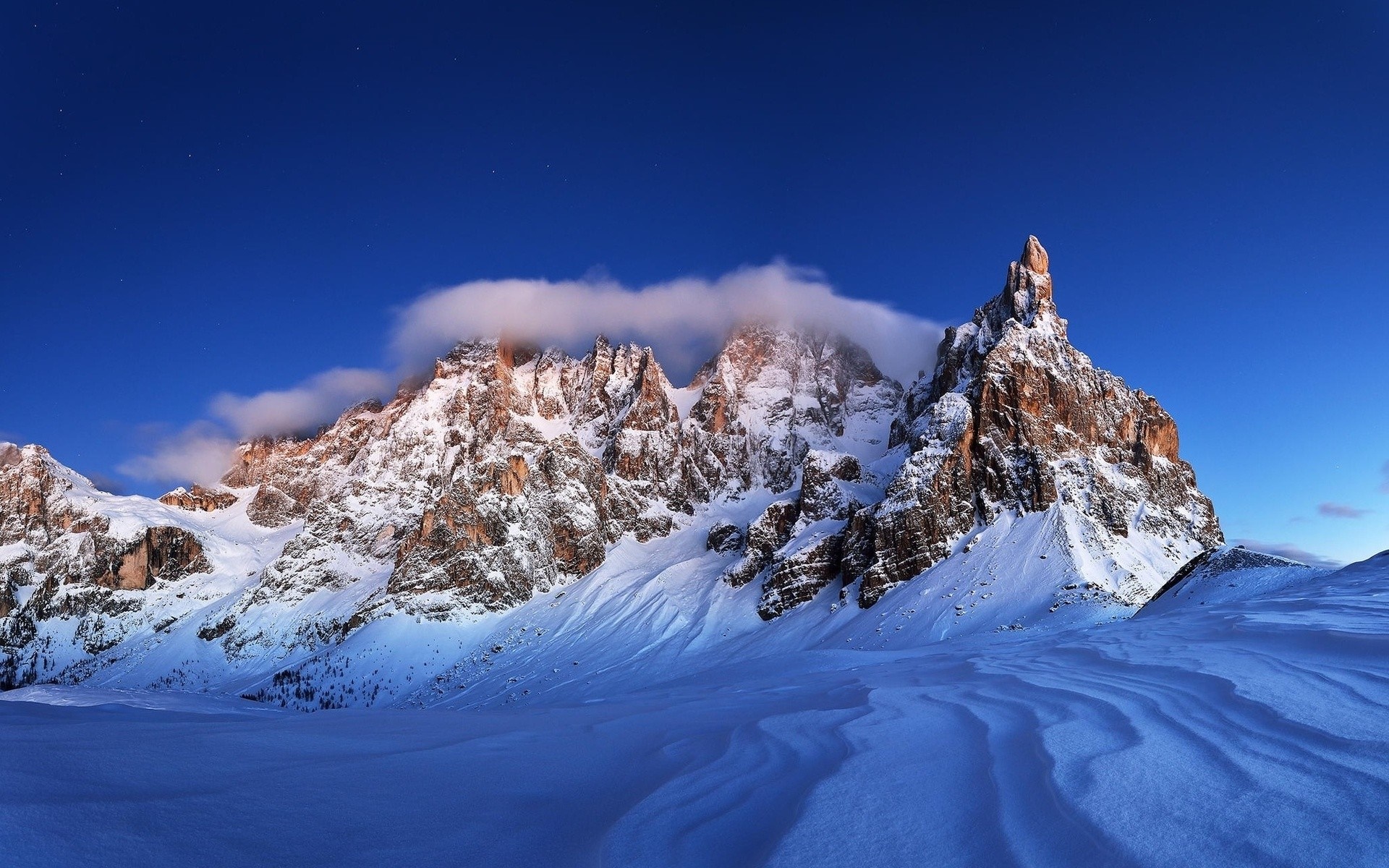 Snow-covered mountains under a clear blue sky HD Wallpaper