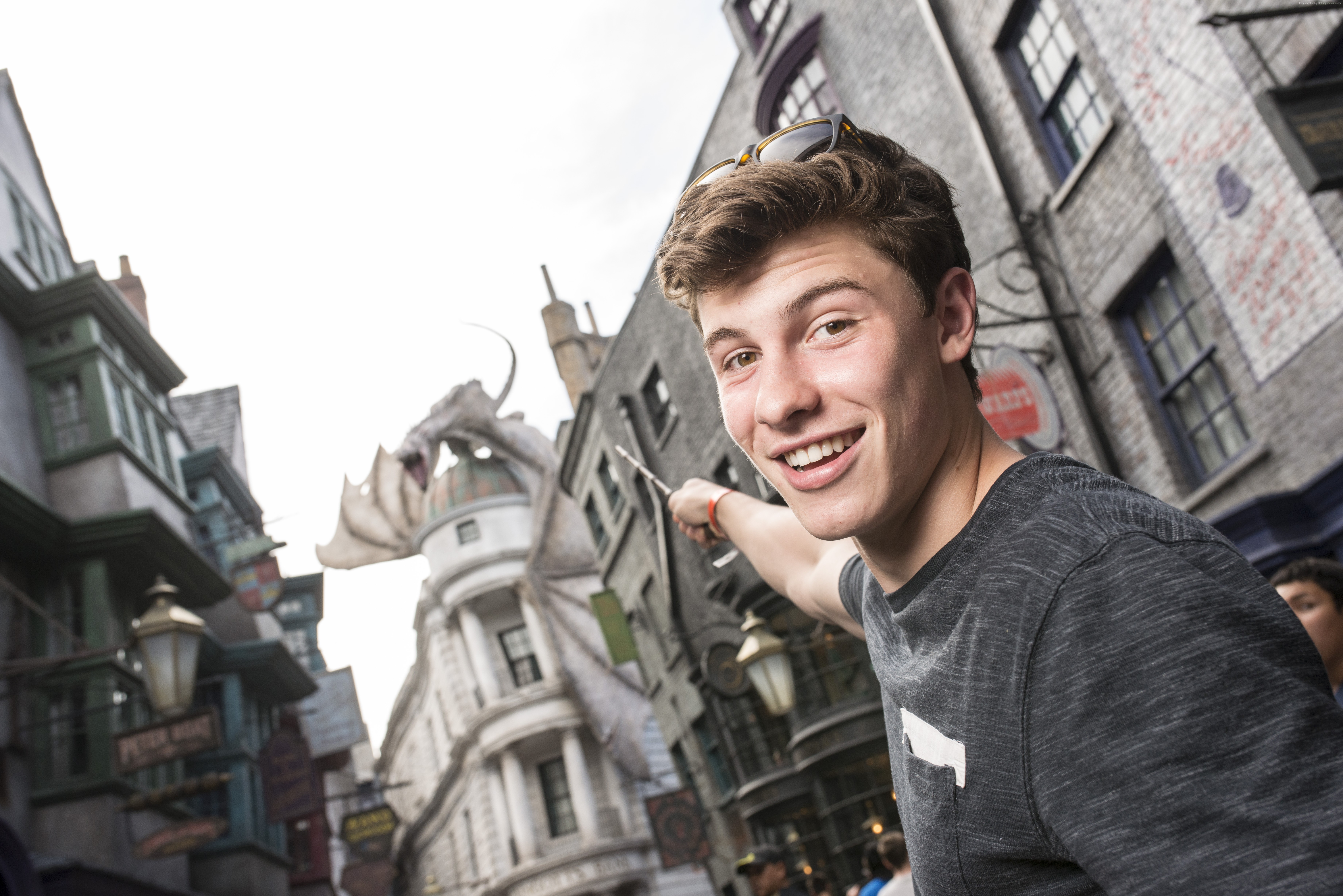 Shawn Mendes in Diagon Alley with Dragon HD Wallpaper