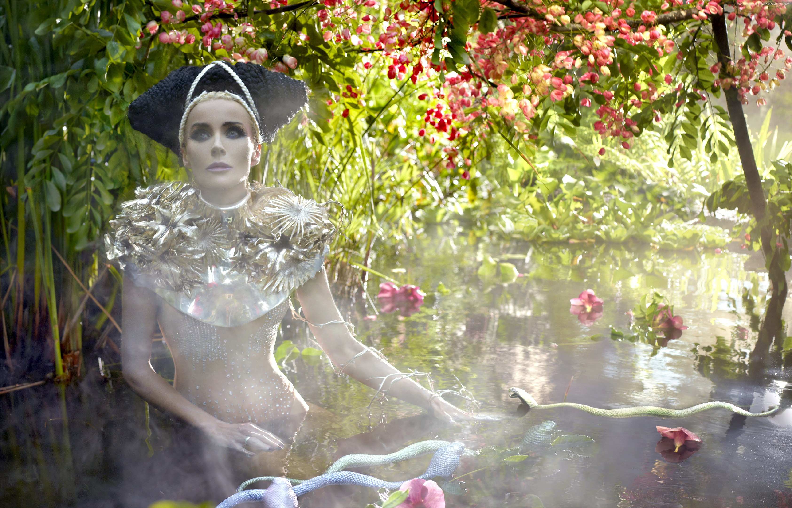 Daphne Guinness in a pond with snakes HD Wallpaper