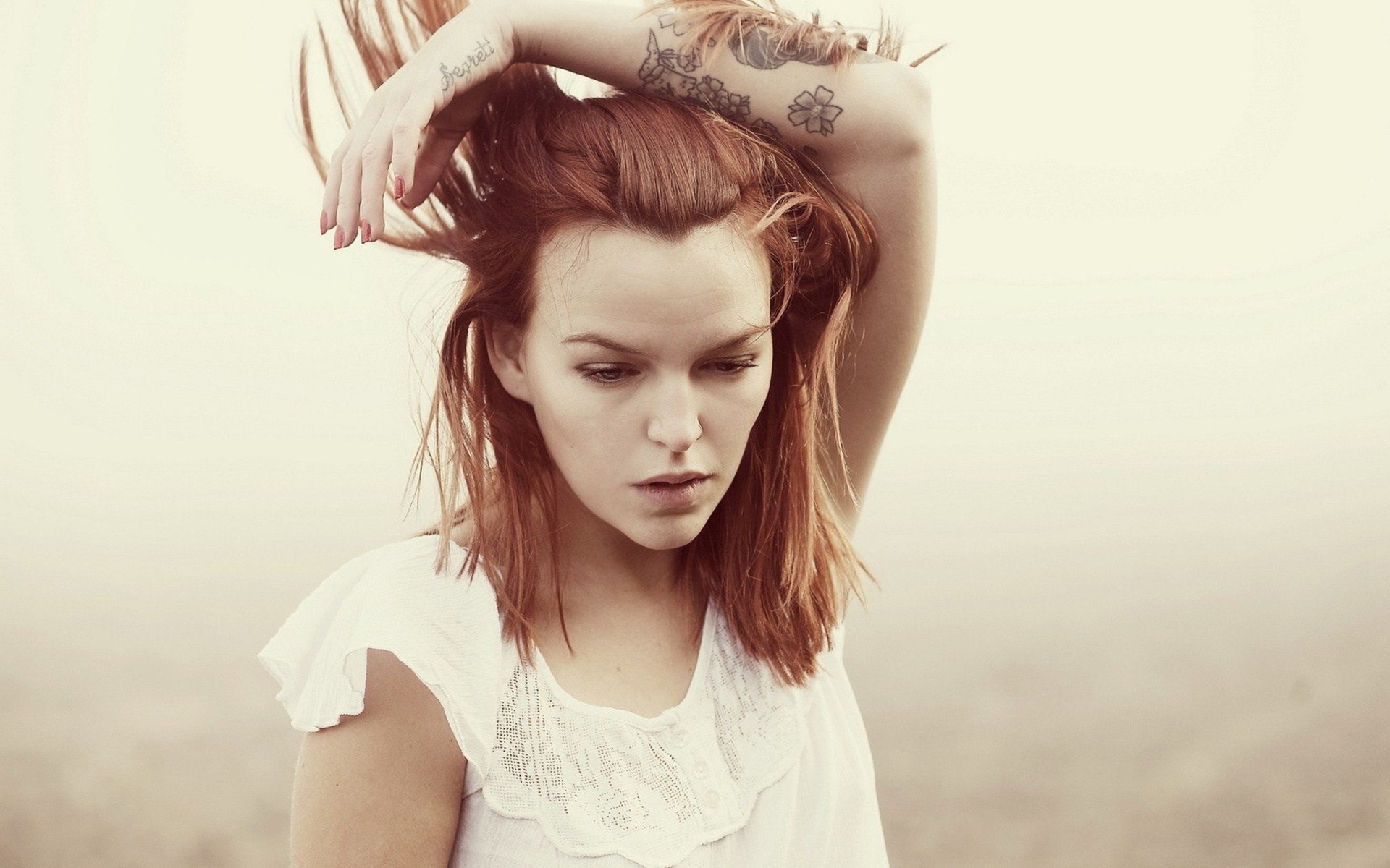 Woman with red hair and tattoos posing HD Wallpaper