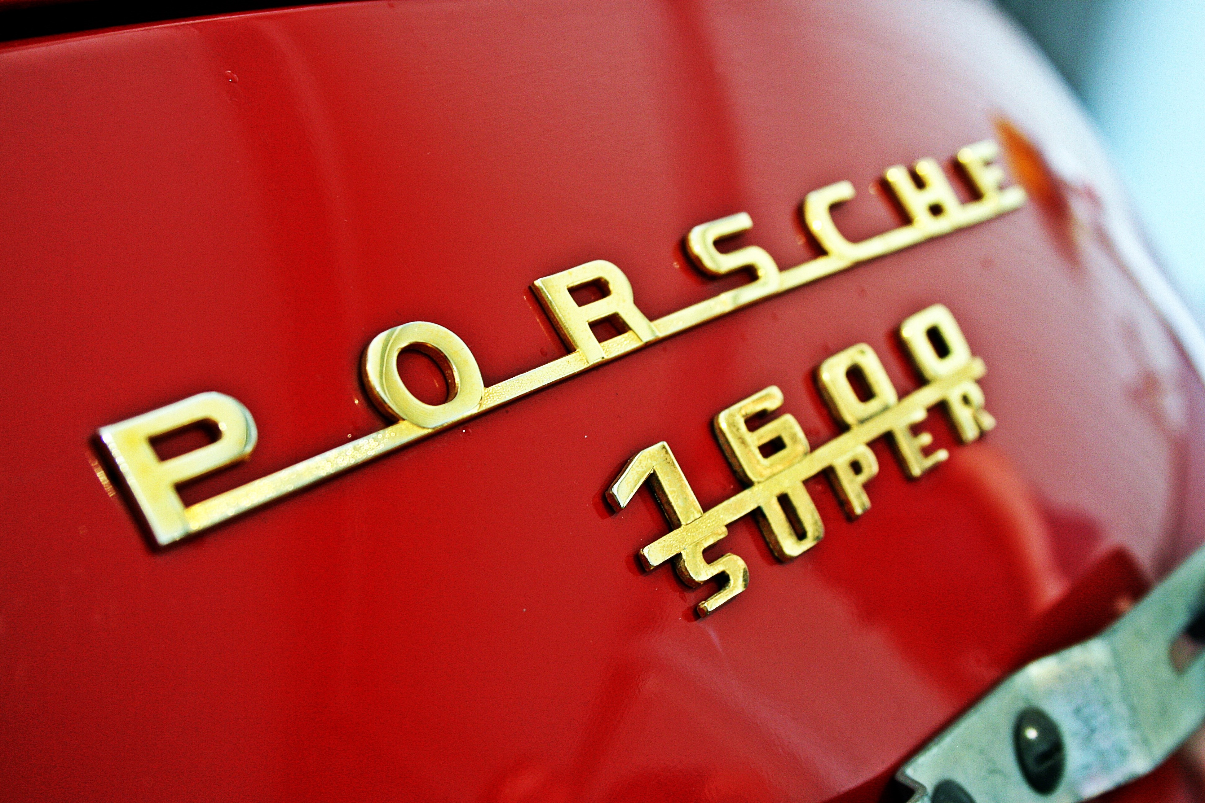 Porsche 1600 Super emblem on red car HD Wallpaper