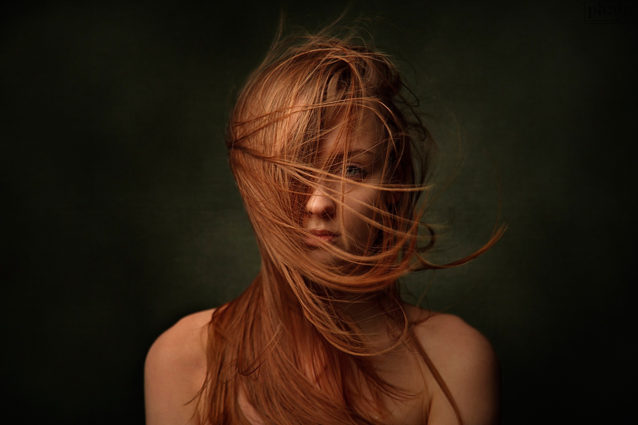 Redhead woman with hair in face portrait HD Wallpaper