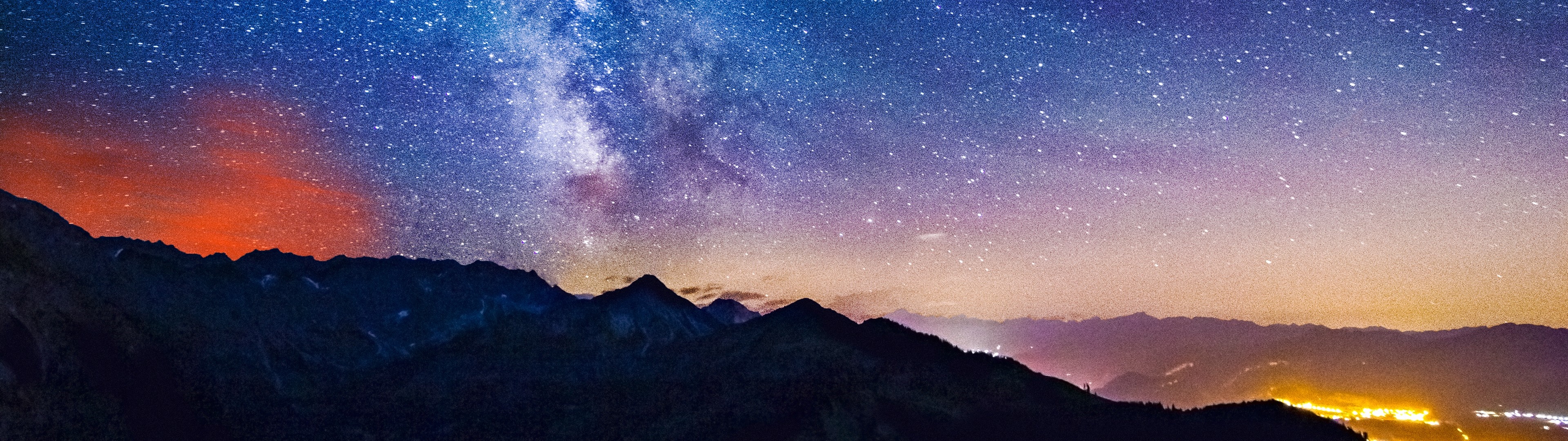 Mountains under a starry night sky with the Milky Way HD Wallpaper