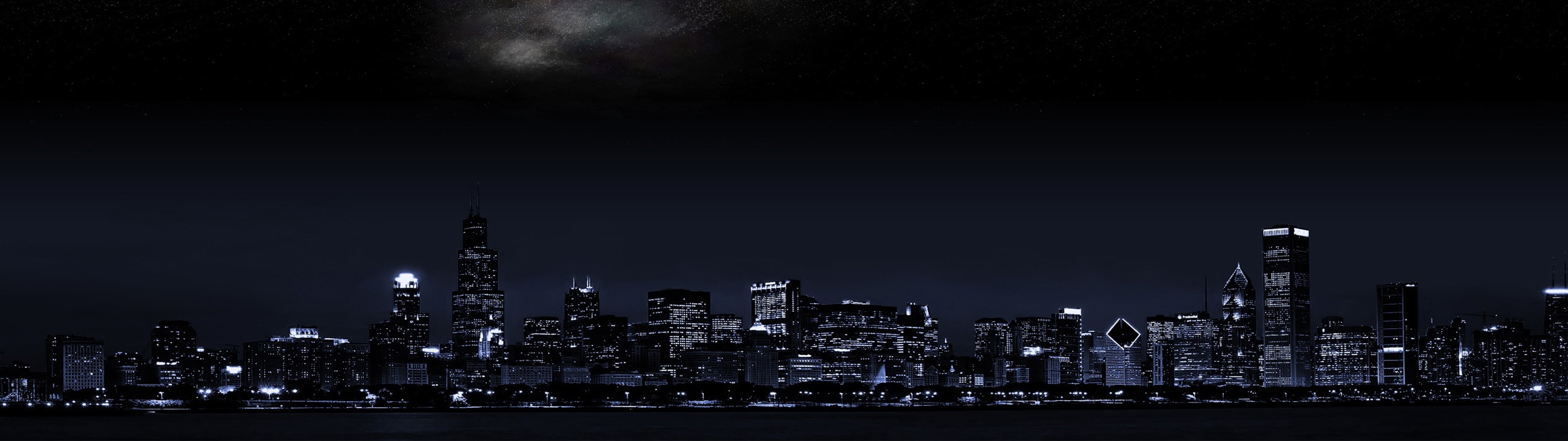 Nighttime Chicago skyline with moonlit clouds HD Wallpaper
