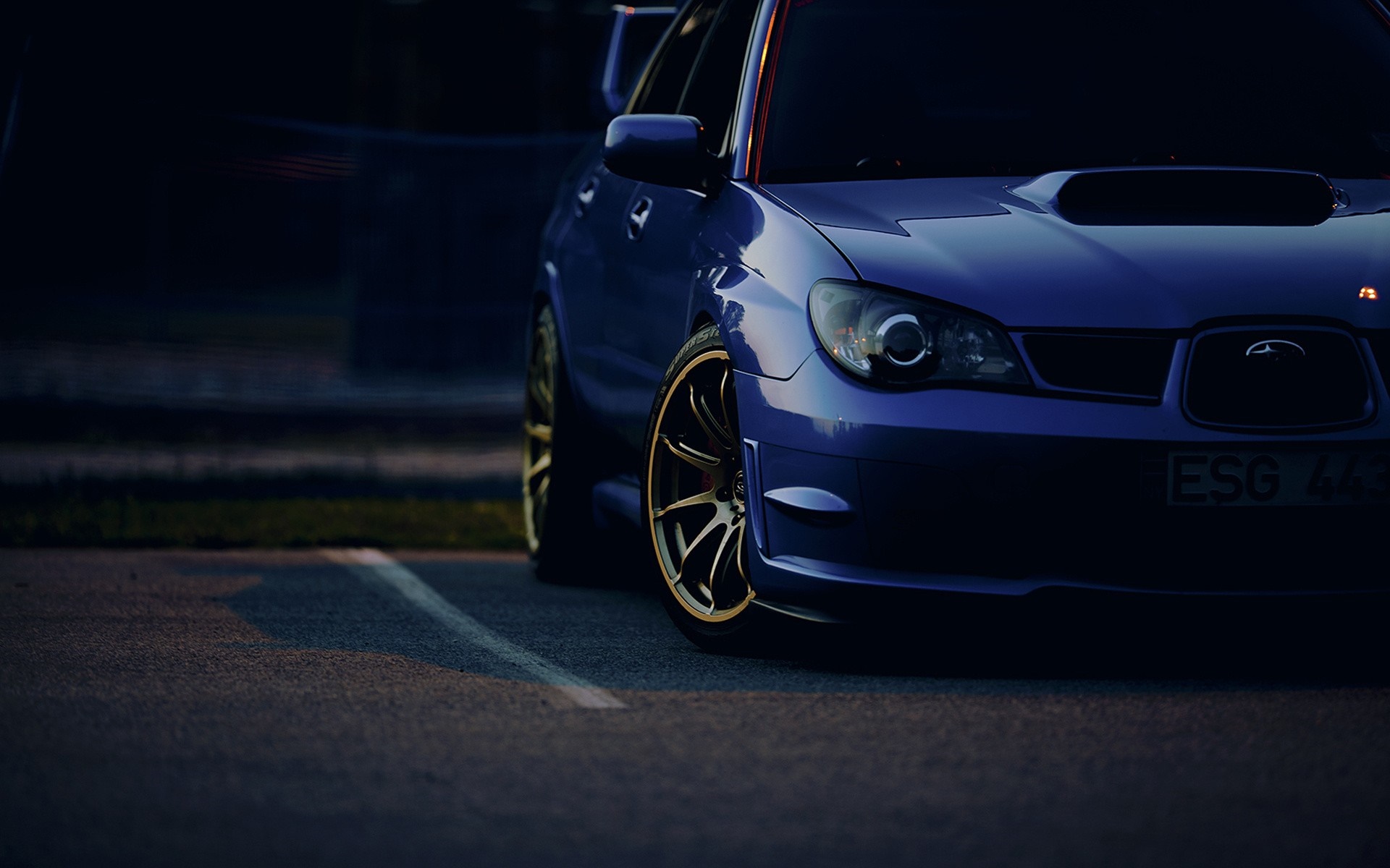 Blue Subaru Impreza WRX STi sports car with gold wheels HD Wallpaper
