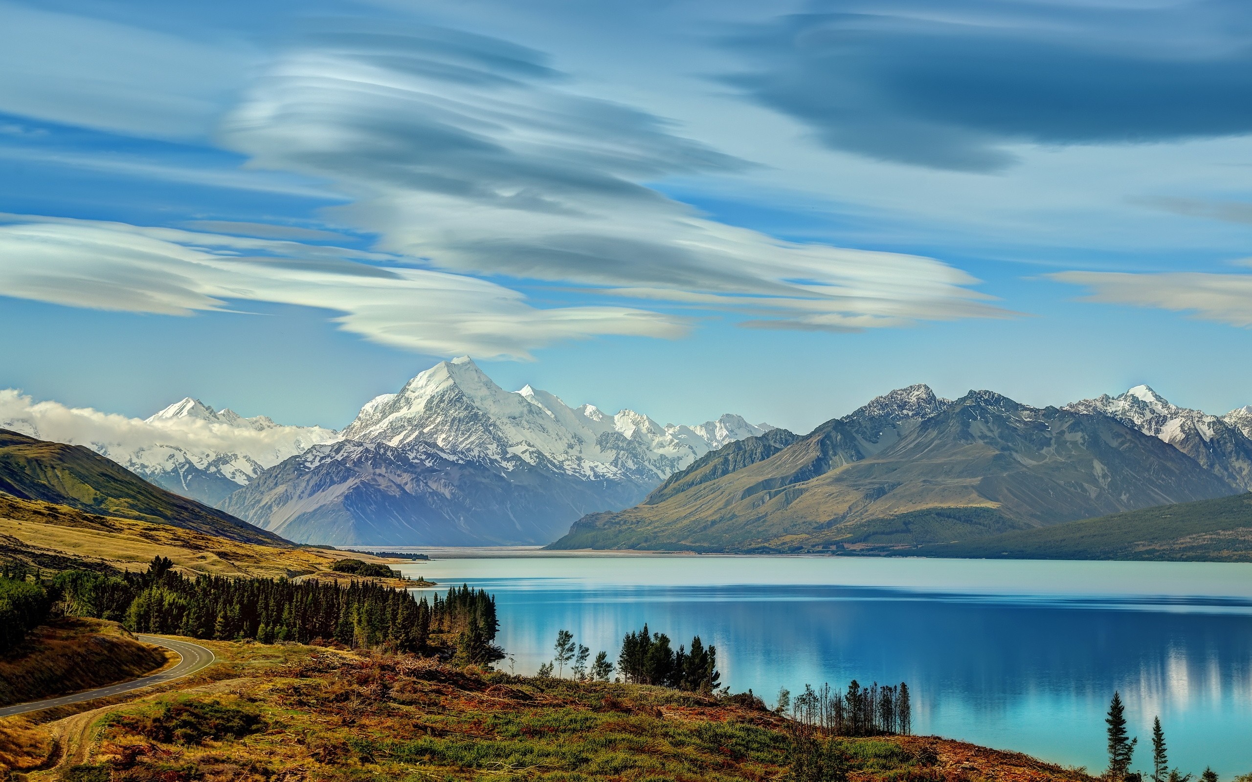 Lake reflection of snow-capped mountains and clouds HD Wallpaper