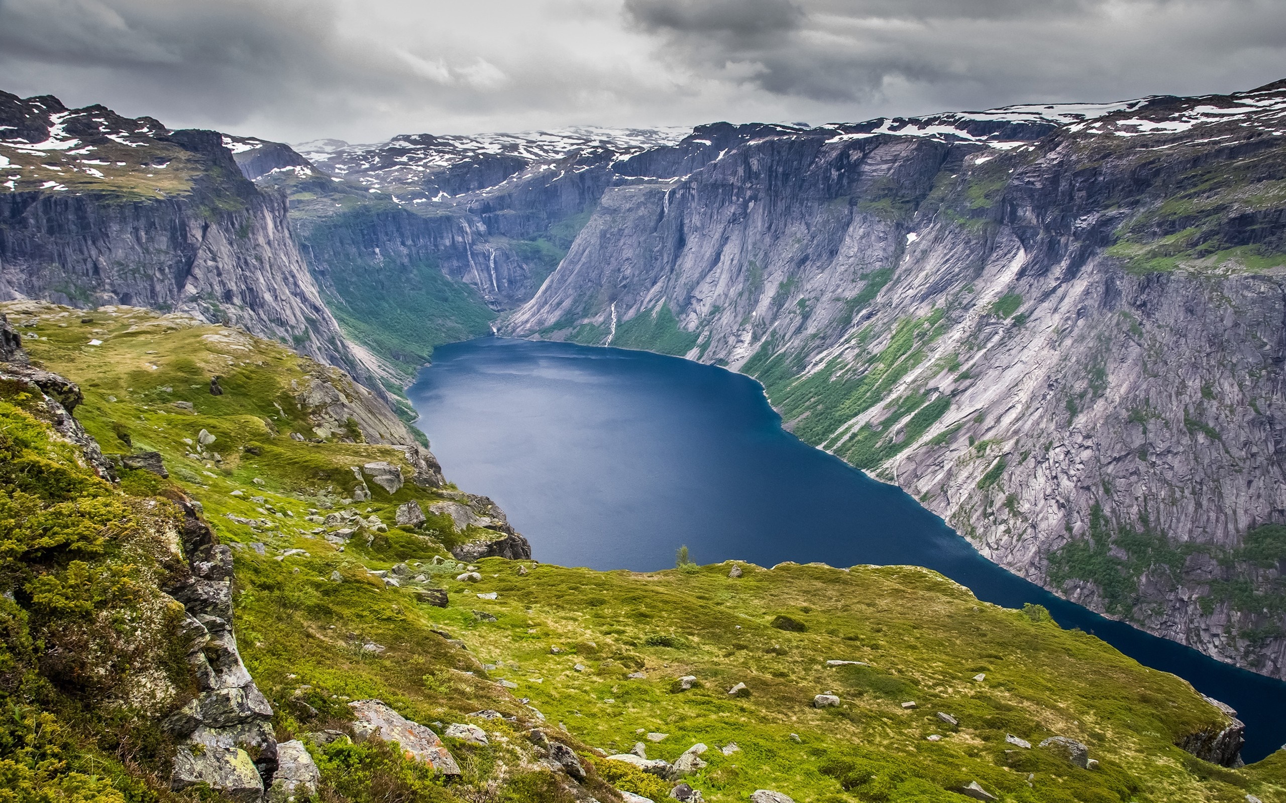 Majestic Fjord Surrounded by Snow-Capped Mountains HD Wallpaper