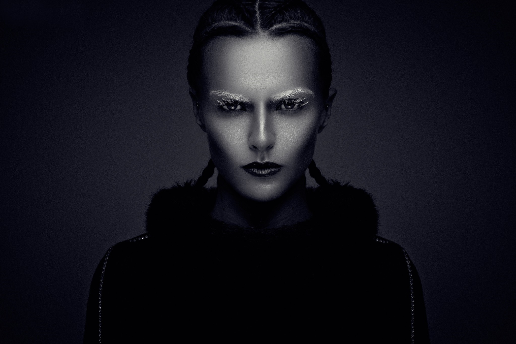 Monochrome portrait of a woman with braided hair and white eyebrows HD Wallpaper