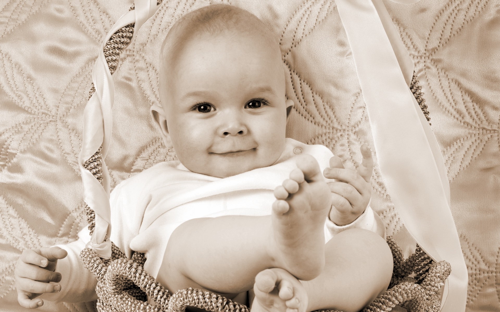 Sepia portrait of a smiling baby HD Wallpaper