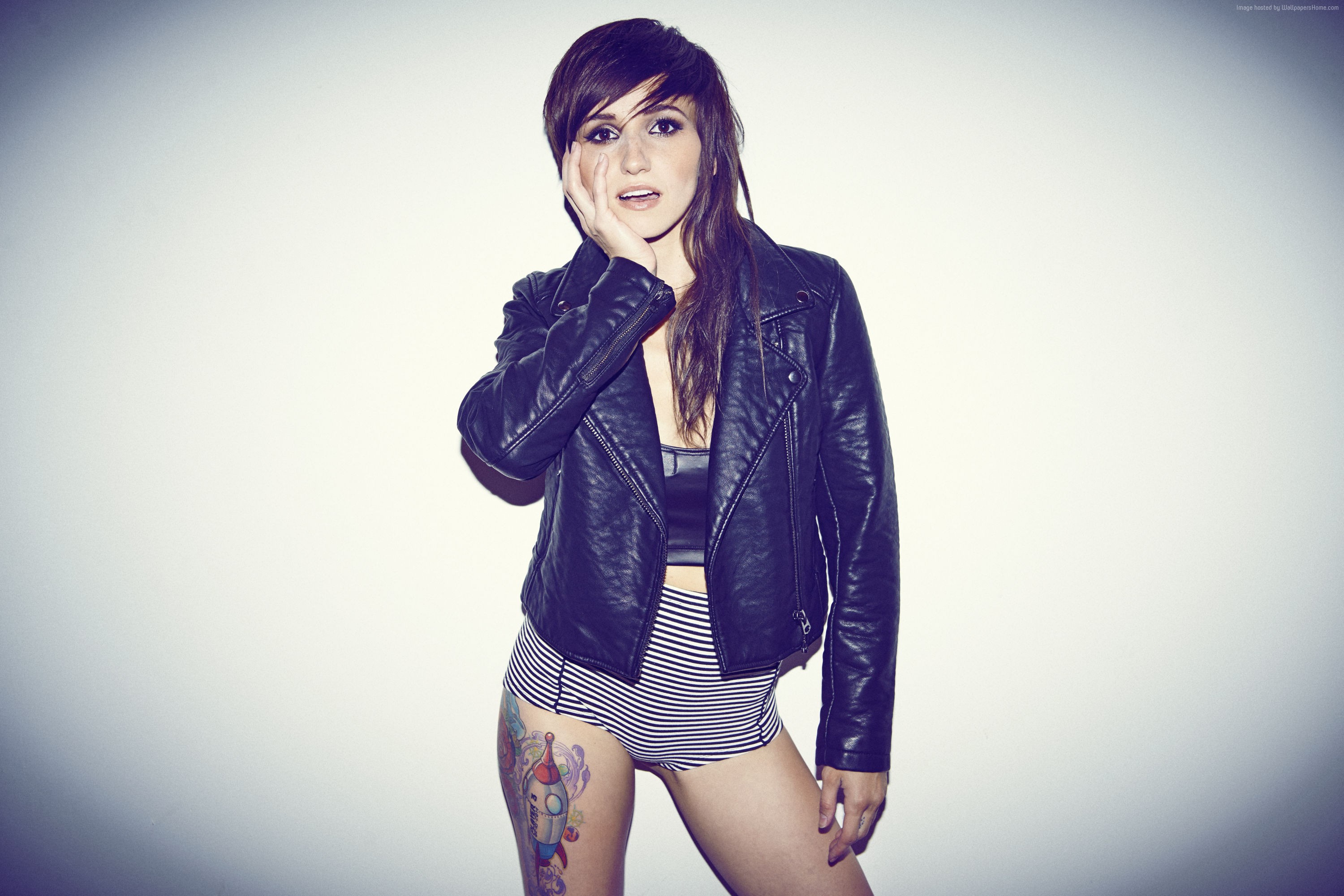 Woman in leather jacket and striped shorts HD Wallpaper