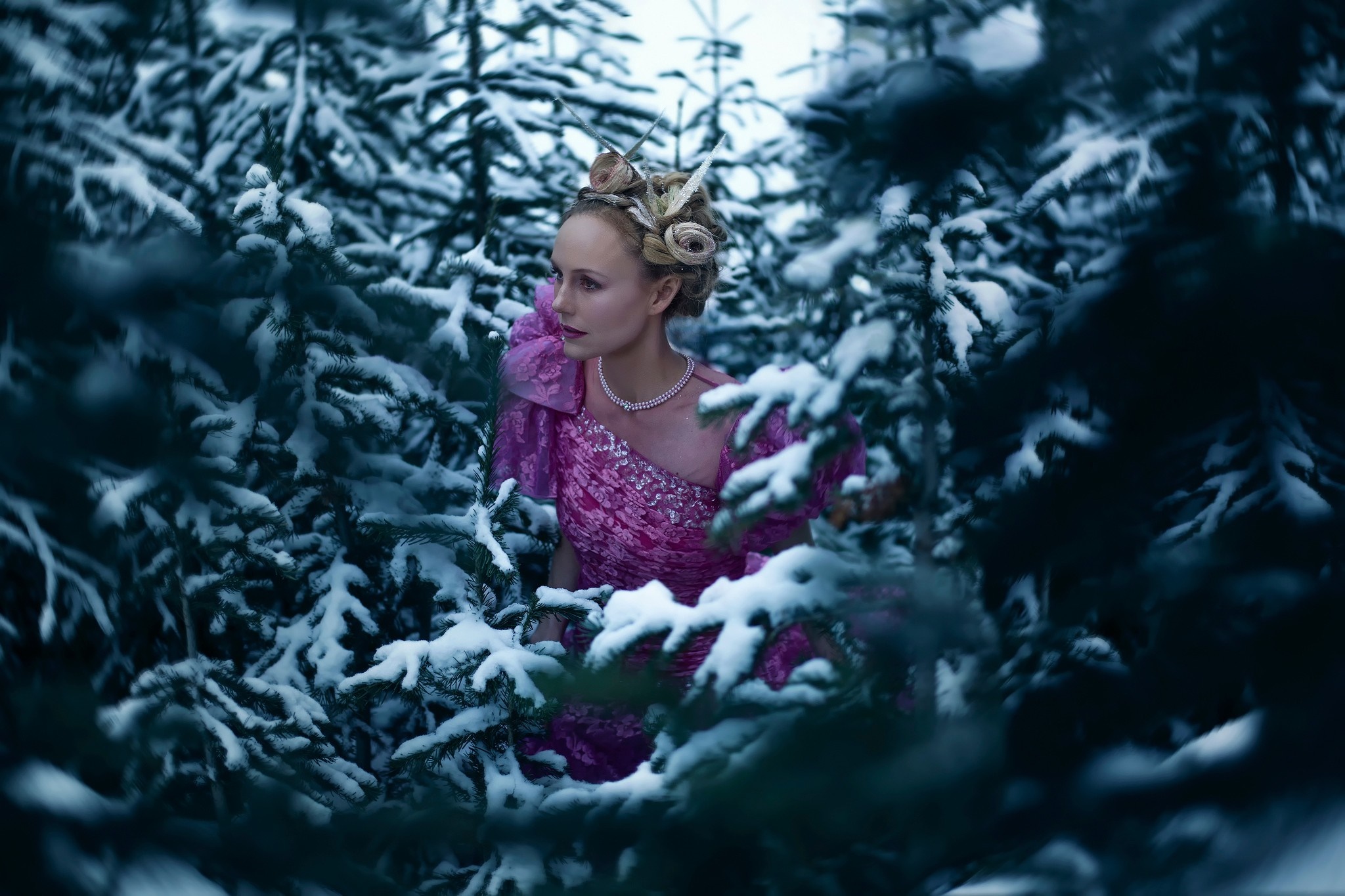 Woman in pink dress in snowy forest HD Wallpaper