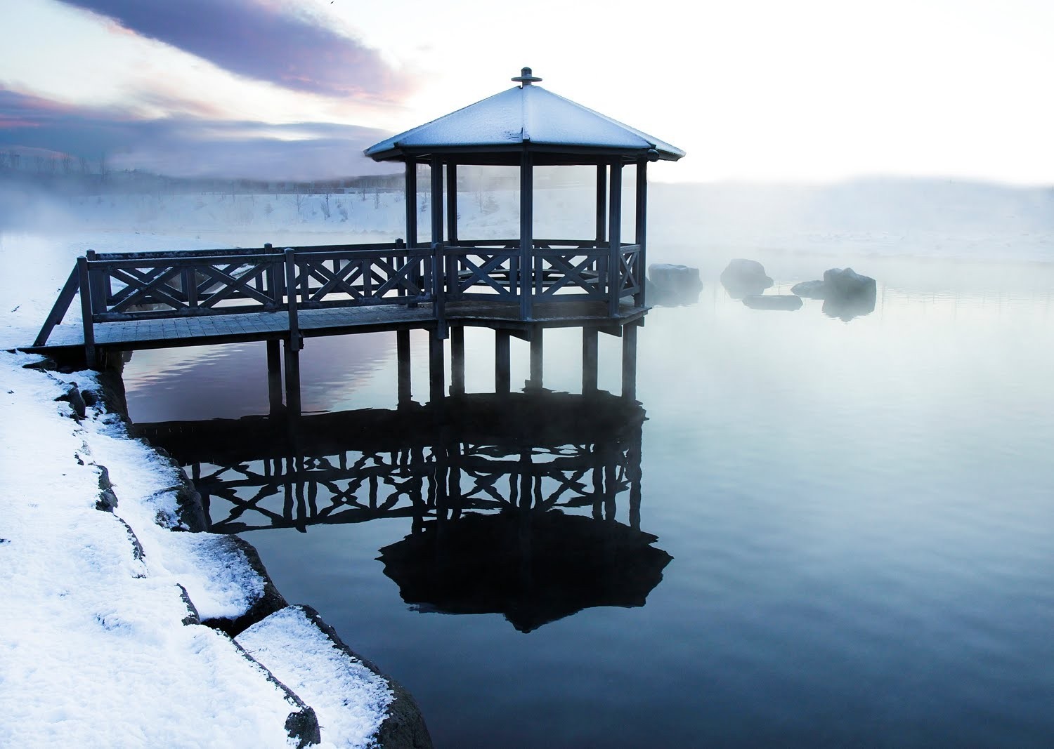 Winter gazebo on a misty lake with snow-covered shore HD Wallpaper